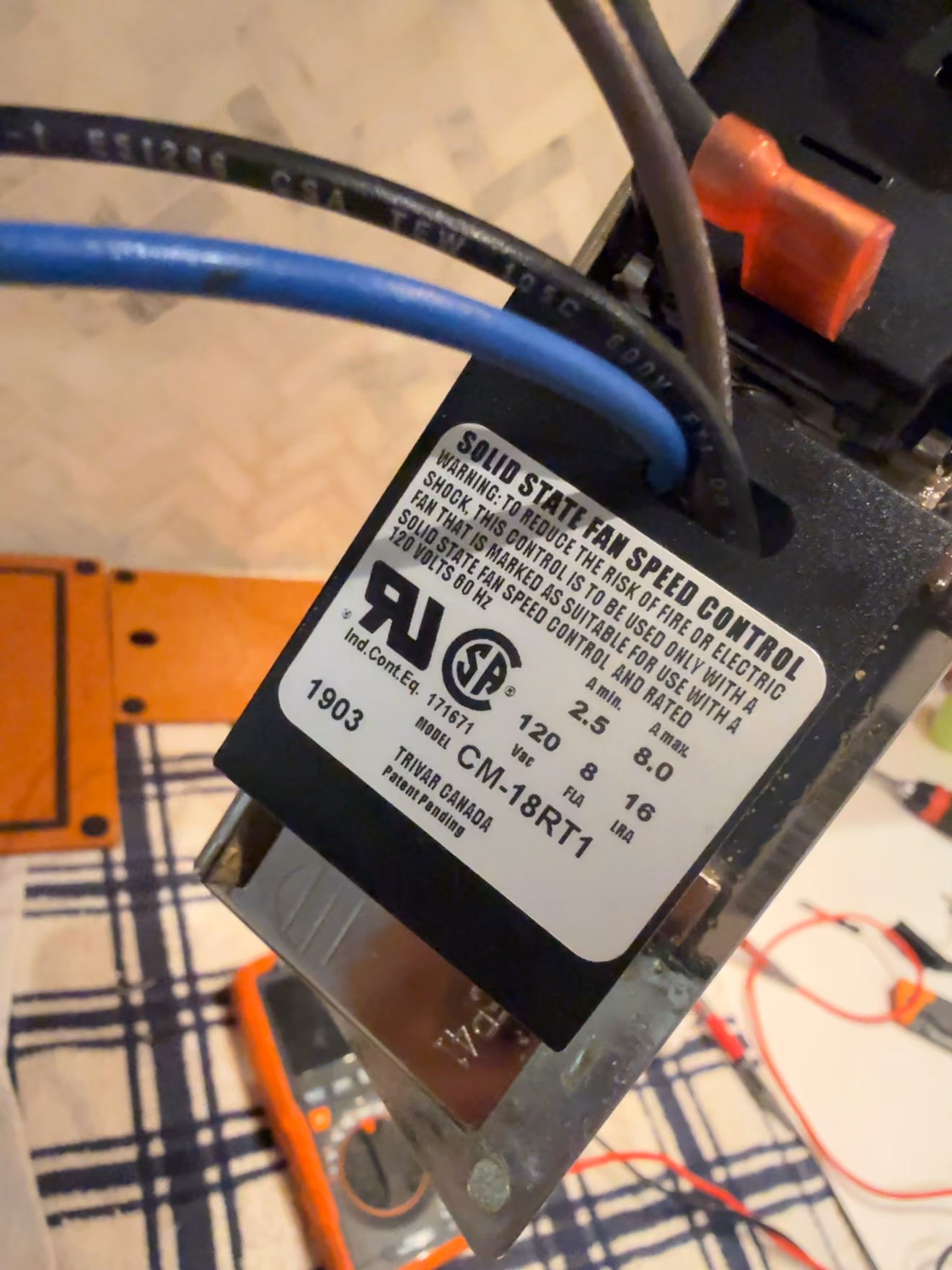 CM-18RT1 speed-control label and connected wiring inside the Wolf hood