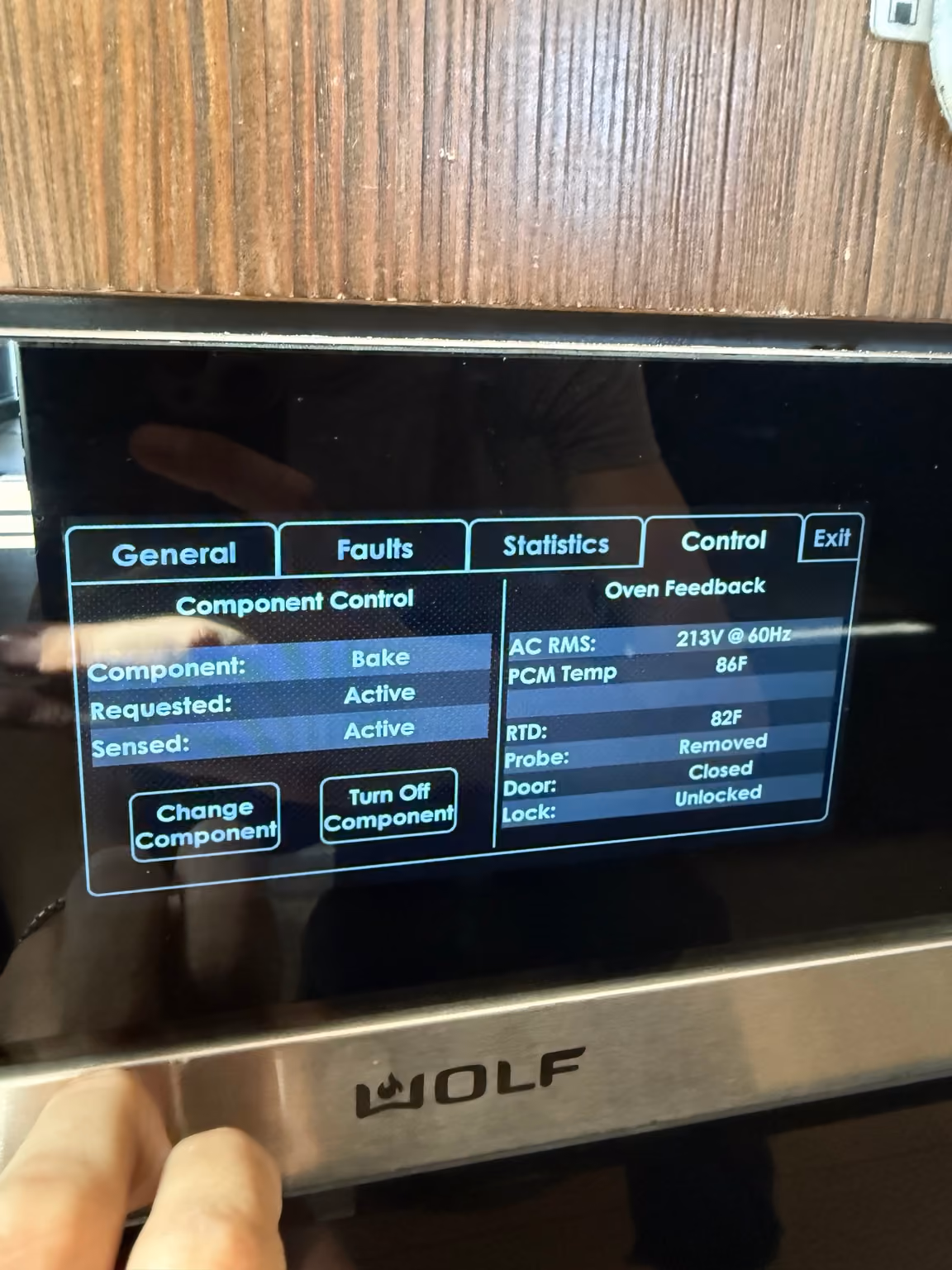 First Wolf oven diagnostic screen showing Bake Requested Active and Sensed Active, 213 V at 60 Hz