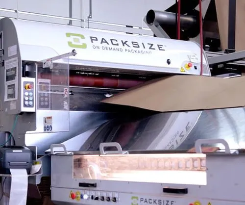 A cropped photo of a Packsize iQ series machine.