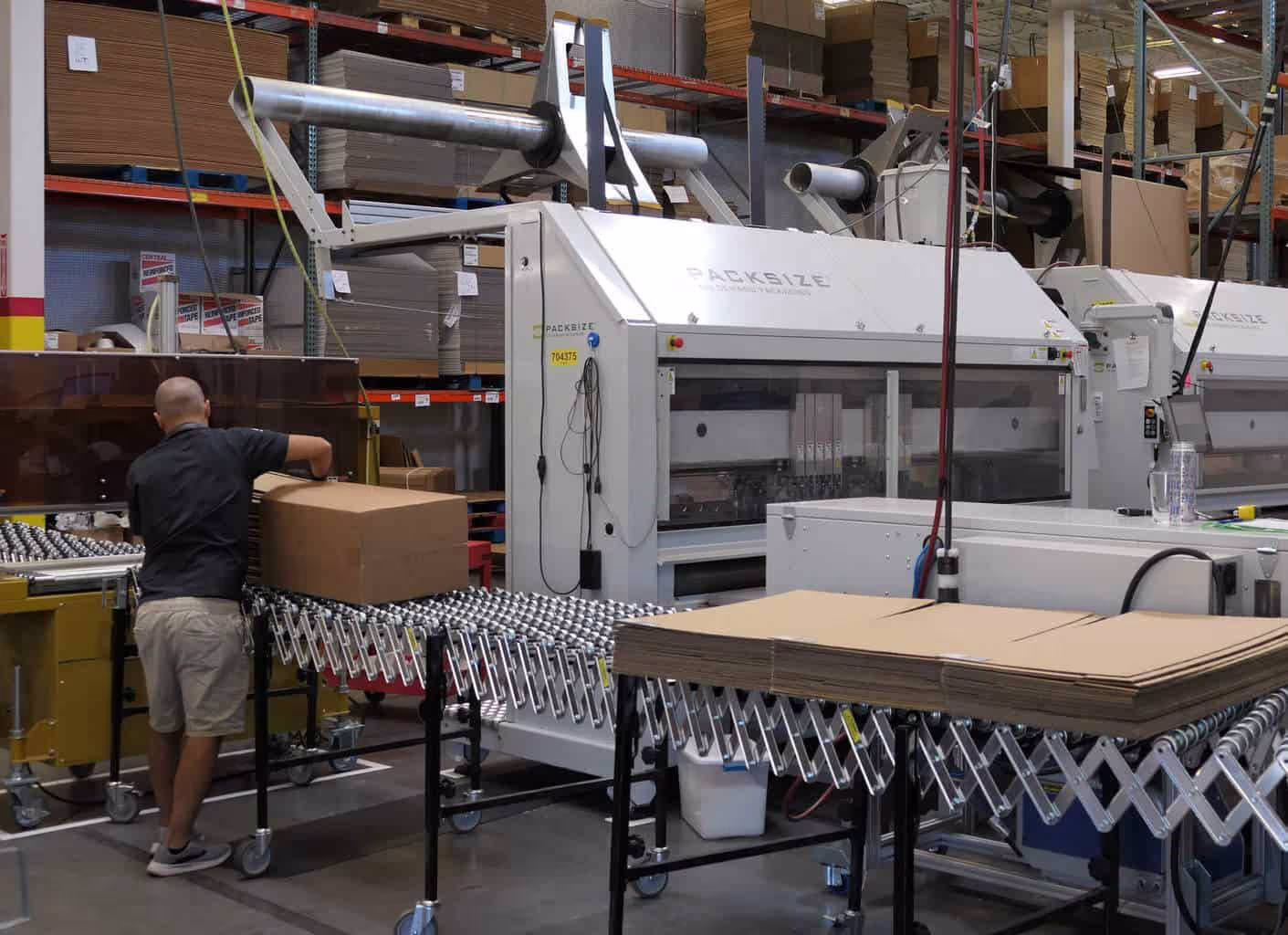 An image of a custom-printed, Packsize box protecting a newly created cabinet