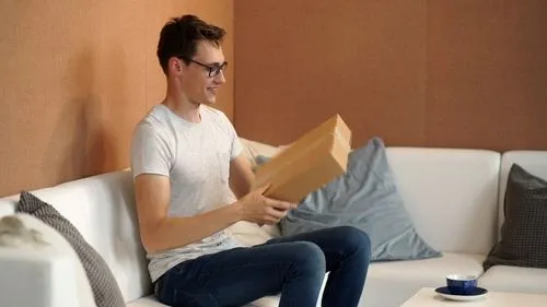 Image of a happy customer with a packaging solution from Packsize.