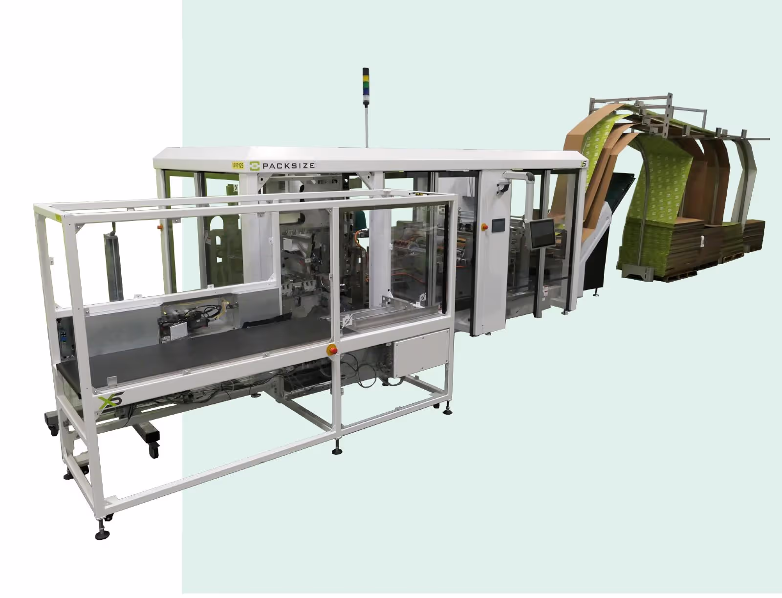 A photo of the Packsize X5 automated packaging machine with a color background.