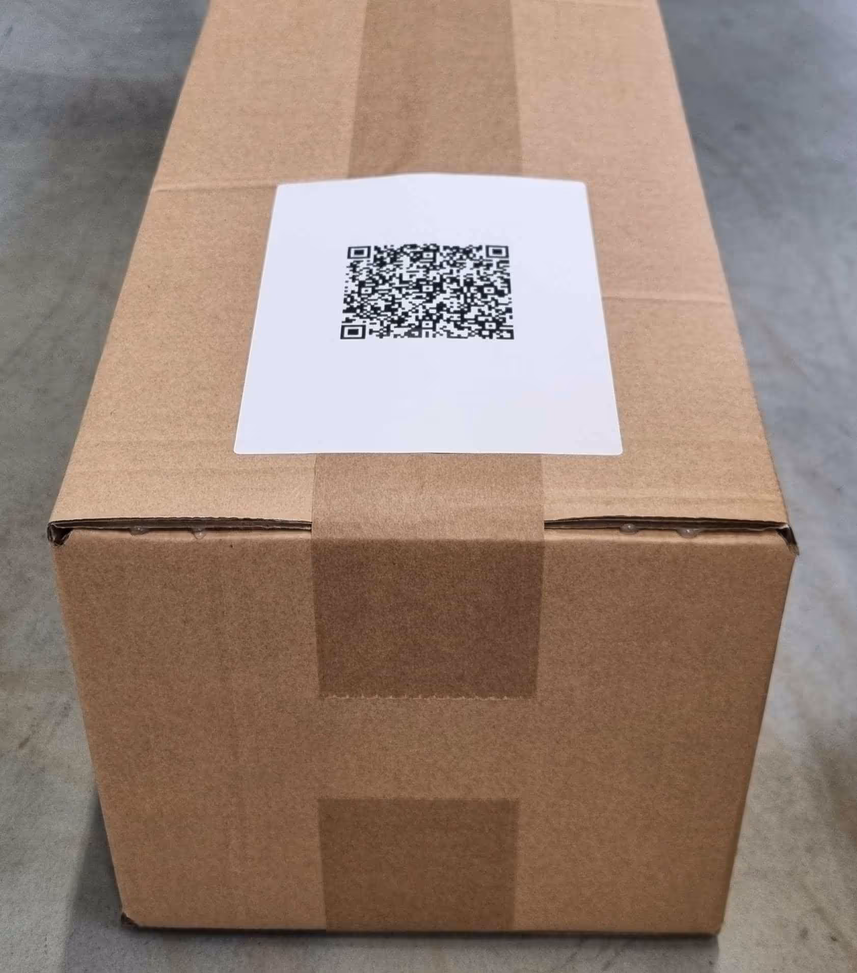 Right-sized & labeled Packsize box packed by packaging robots.