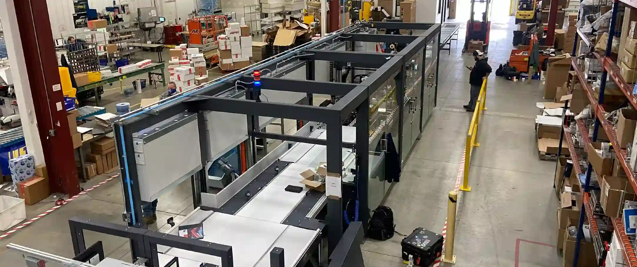 The image shows the CVP Impack at ECS Tuning that can perform the work of roughly twenty human packers in an eight-hour period.