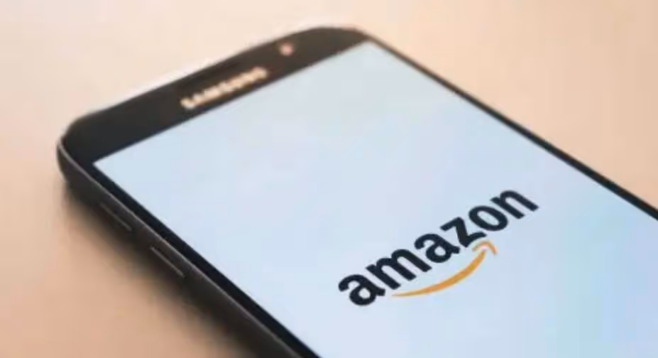Samsung smartphone displaying the Amazon logo on its screen.