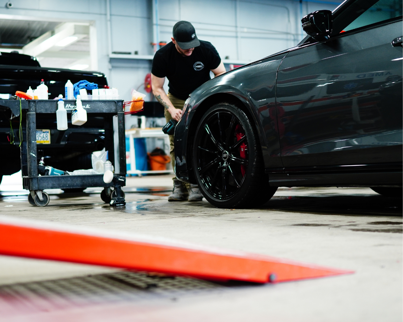 Final repair touches photographed for Kos's Body Shop