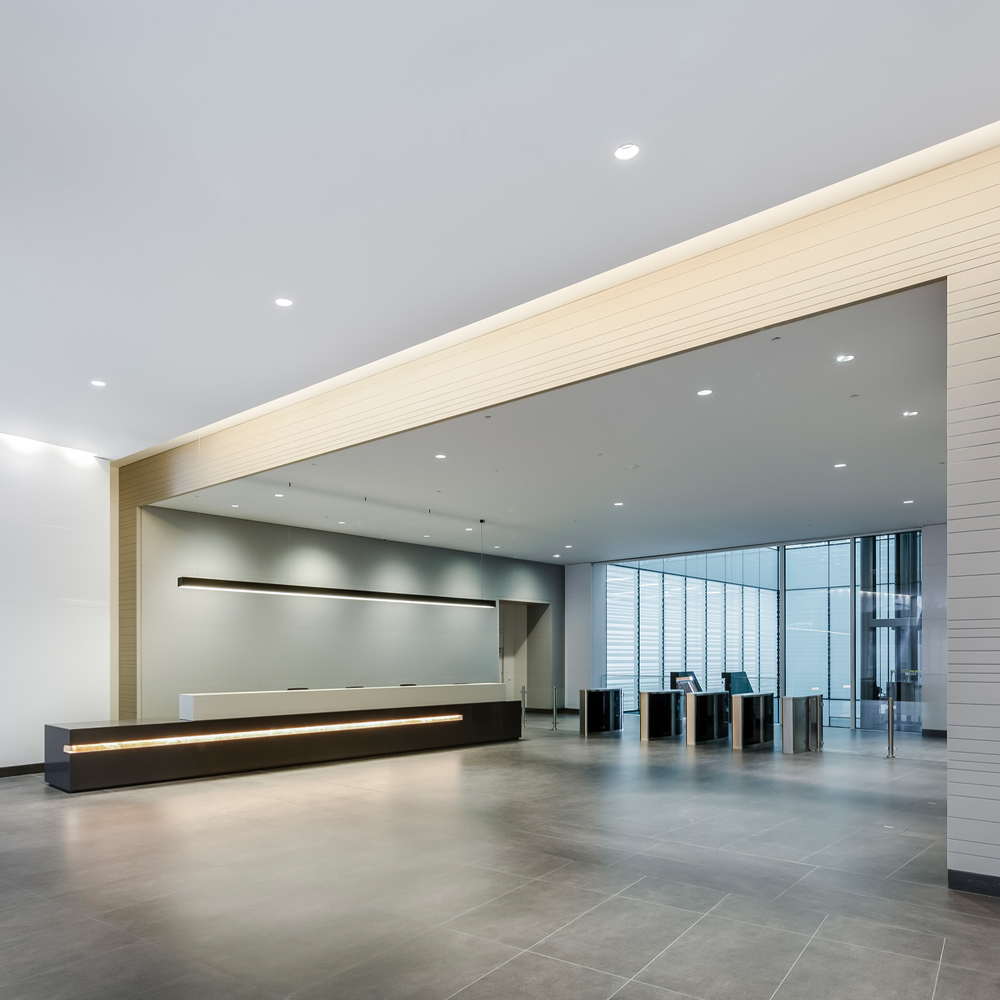 Website blog page featuring large 'Blogs' text, navigation menu, and previews of blog posts with abstract images and titles about design and development.