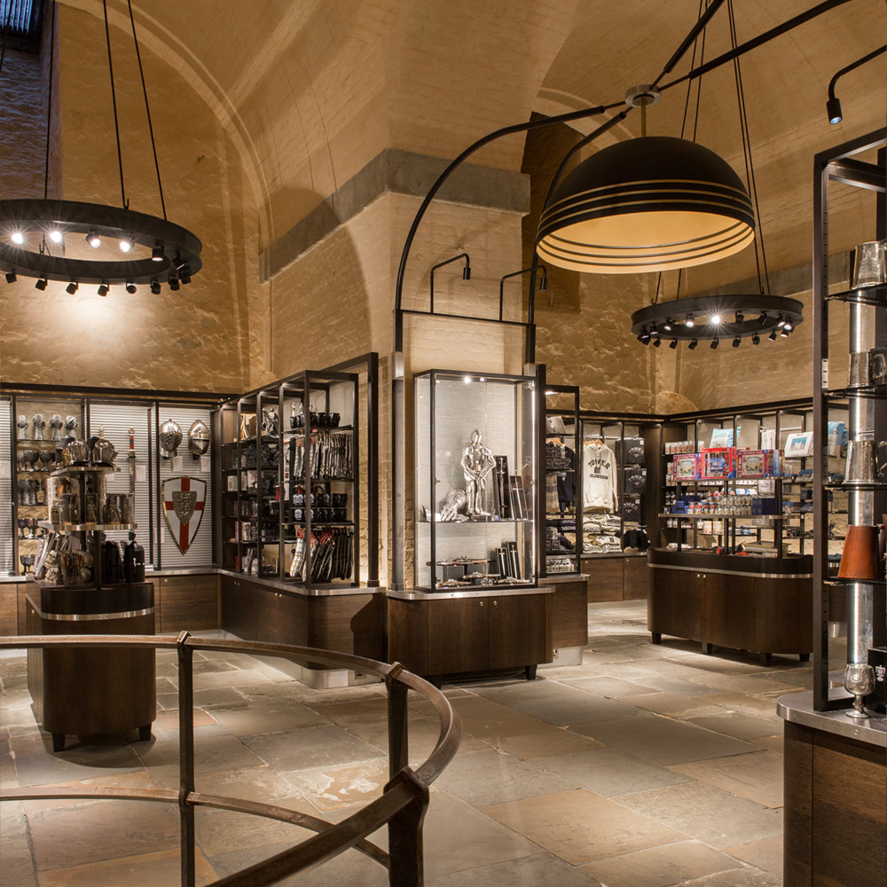 Abstract wavy lines gradient in yellow and orange on a soft blue-gray background.