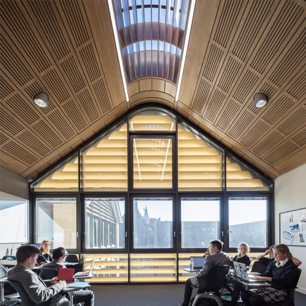 Website blog page featuring large 'Blogs' text, navigation menu, and previews of blog posts with abstract images and titles about design and development.