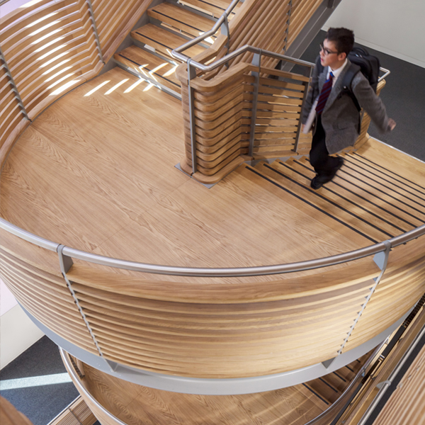 Blurred green surface with horizontal lines and a light gradient background.