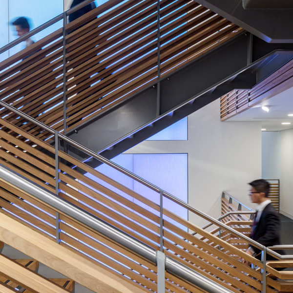 Website blog page featuring large 'Blogs' text, navigation menu, and previews of blog posts with abstract images and titles about design and development.