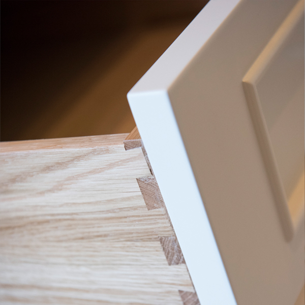 Website blog page featuring large 'Blogs' text, navigation menu, and previews of blog posts with abstract images and titles about design and development.