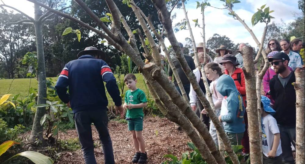 Visitors and volunteers participating in shared care at Ediblescapes