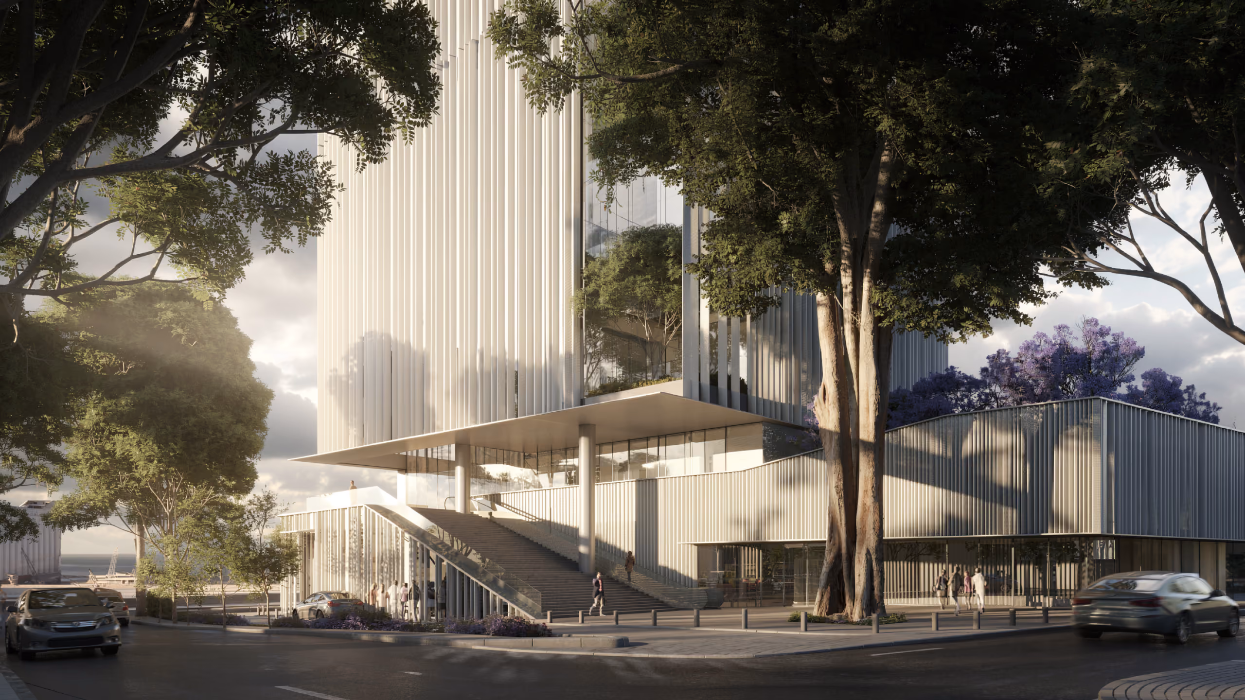 Street-level view of the Bank Headquarters in Beirut, louvered tower on slender columns with a sweeping staircase and glazed lobby shaded by mature trees
