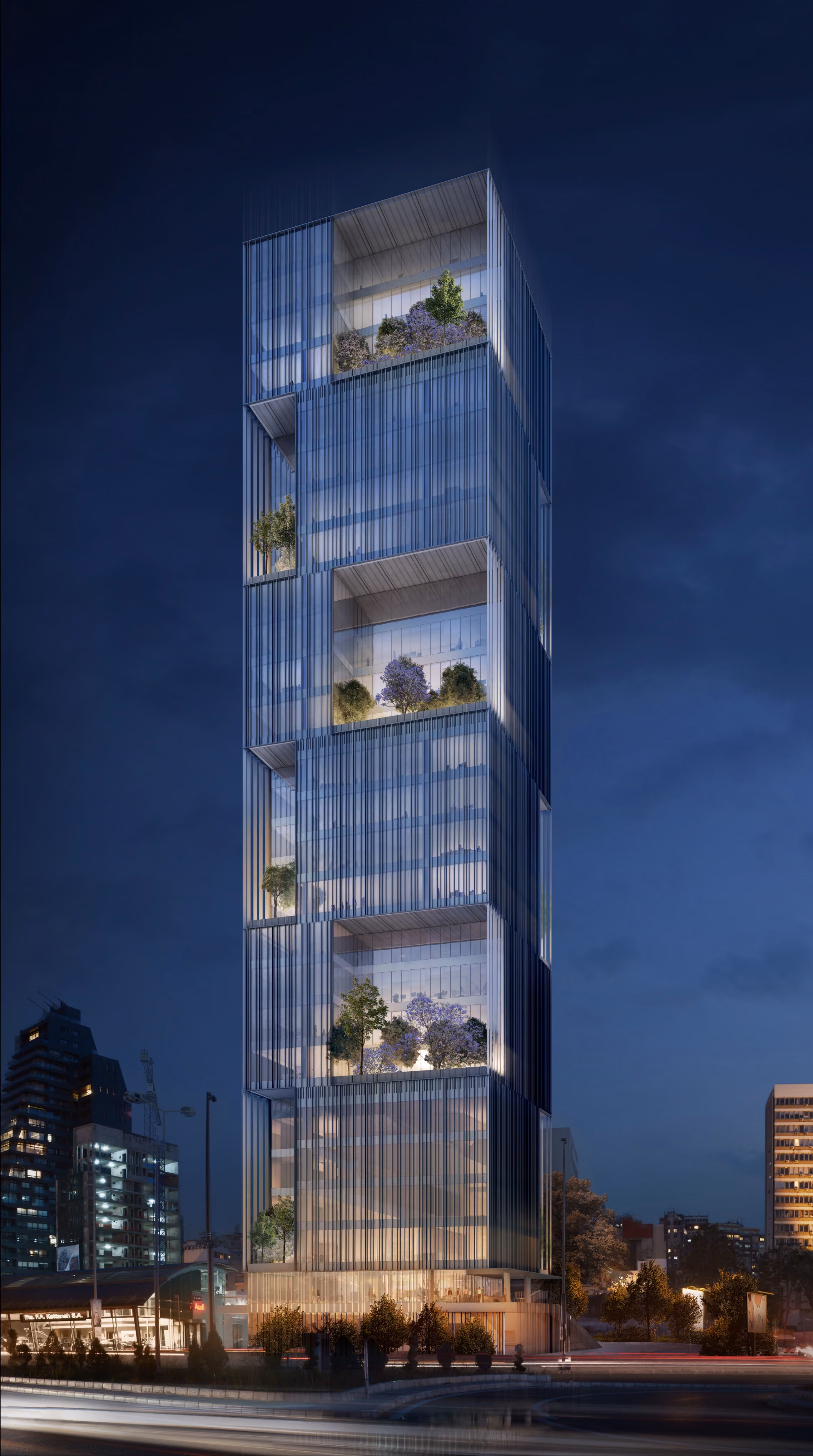 Bank Headquarters tower in Beirut at night, ribbed glass facade with recessed sky gardens of trees glowing between floors above the city street