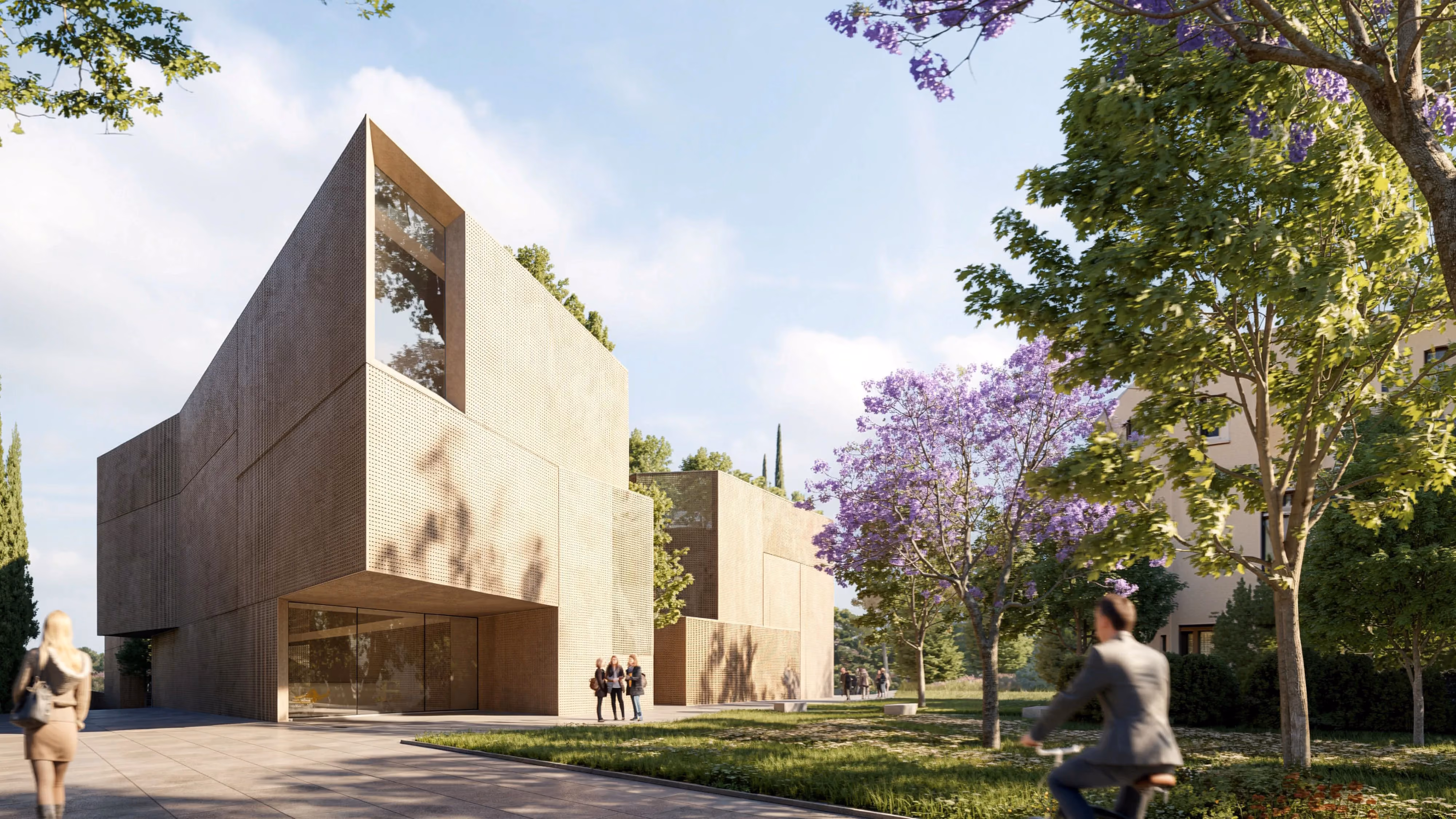 Corporate Academy by Nabil Gholam Architects in Marseille, France, angular limestone-clad volumes with glazed openings set among trees and jacaranda blossoms