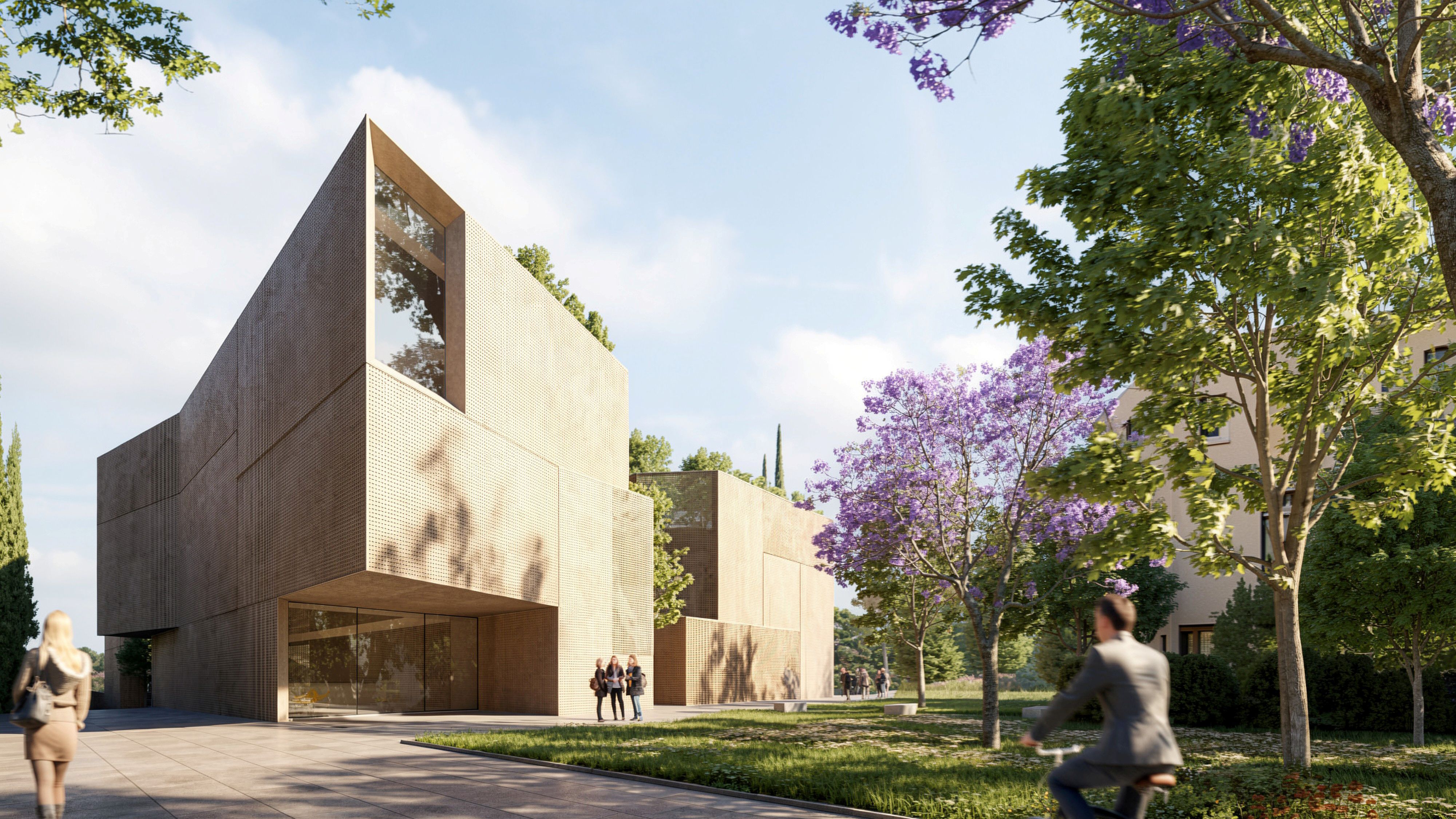 Corporate Academy by Nabil Gholam Architects in Marseille, France, angular limestone-clad volumes with glazed openings set among trees and jacaranda blossoms