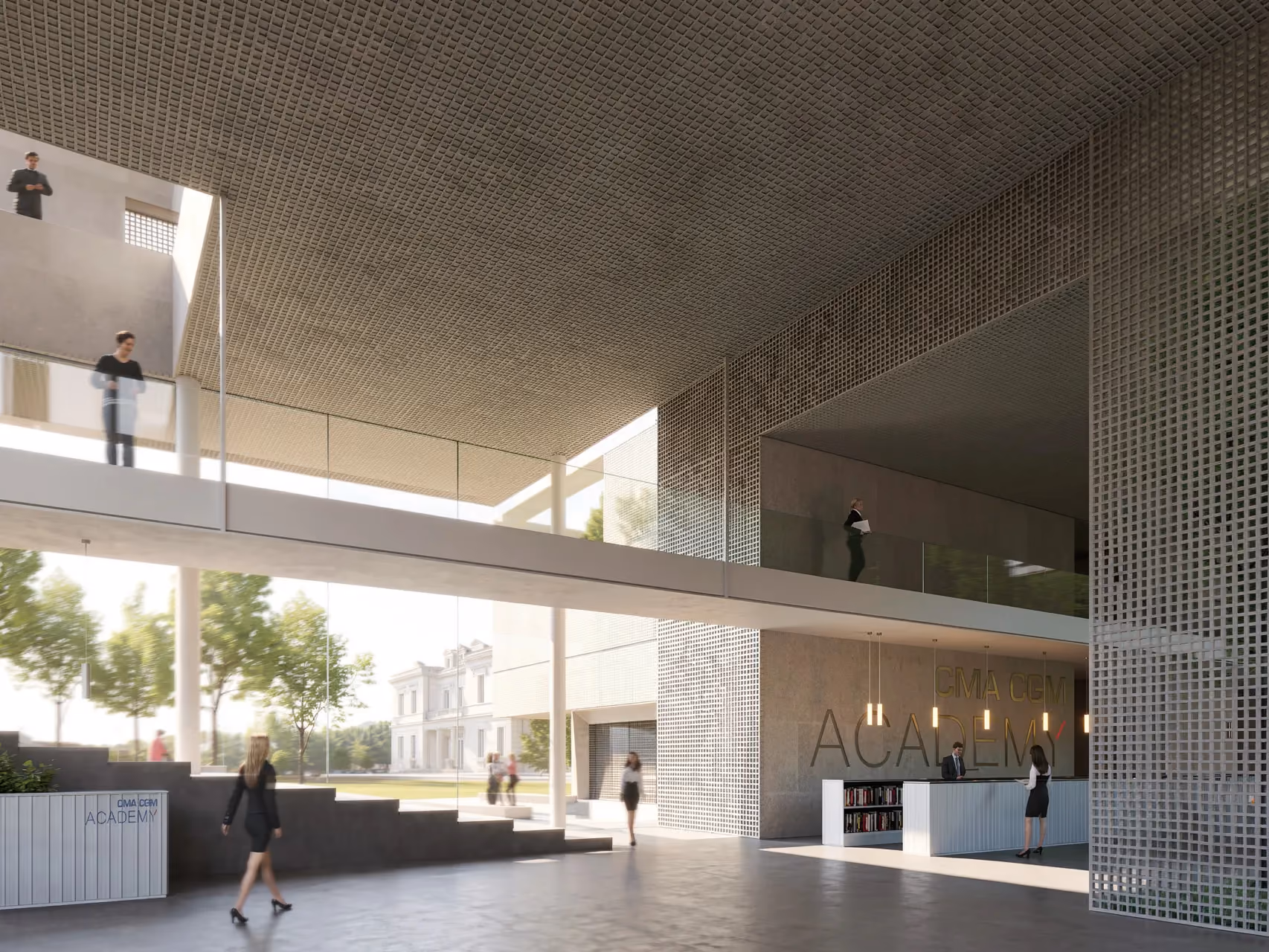 Entrance lobby of the CMA CGM Academy in Marseille, with perforated metal cladding, a mezzanine bridge and reception desk lined with books