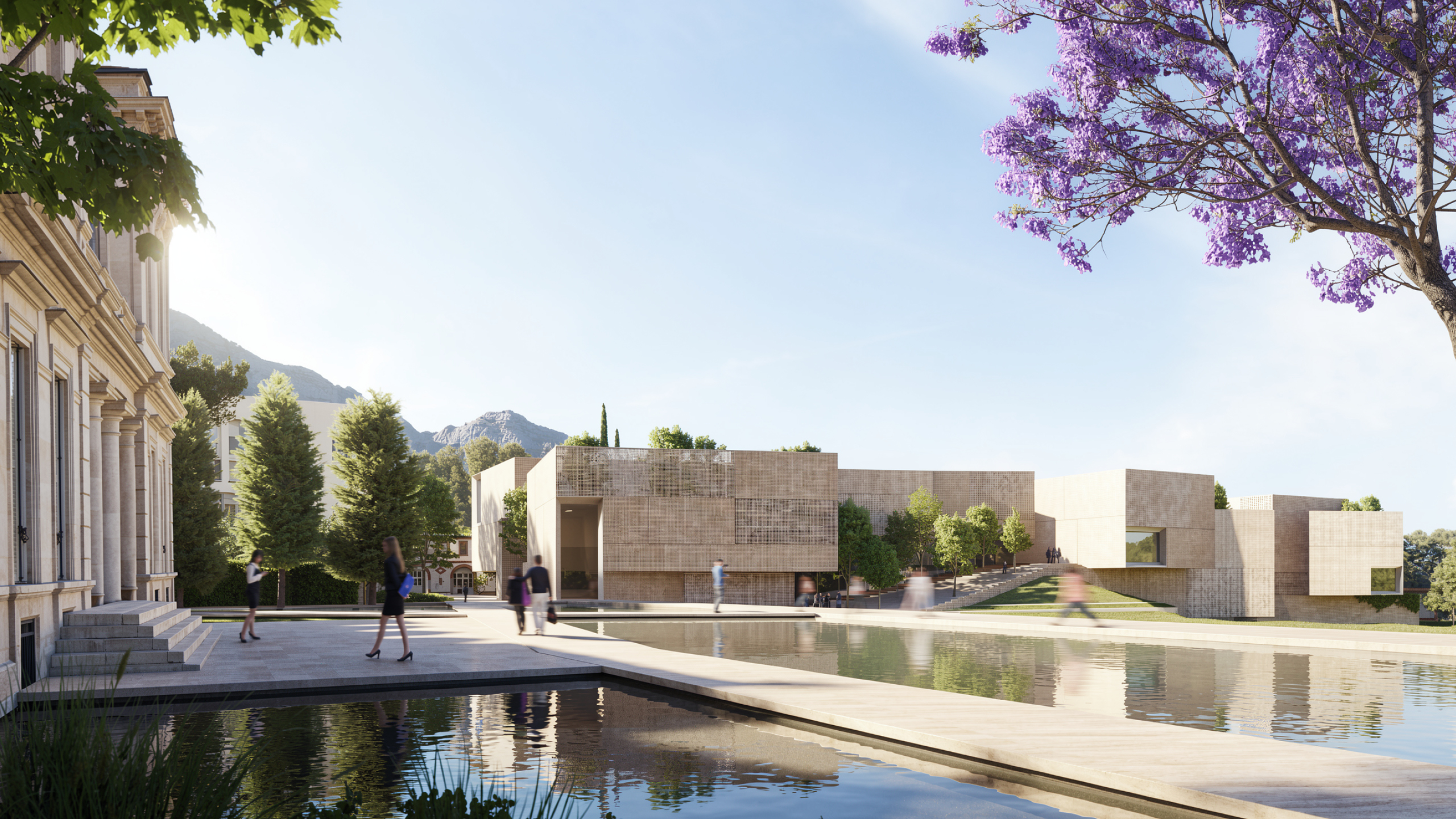 Stone-clad pavilions of the Corporate Academy in Marseille flank a reflecting pool, with the historic Bastide building and a flowering jacaranda tree nearby