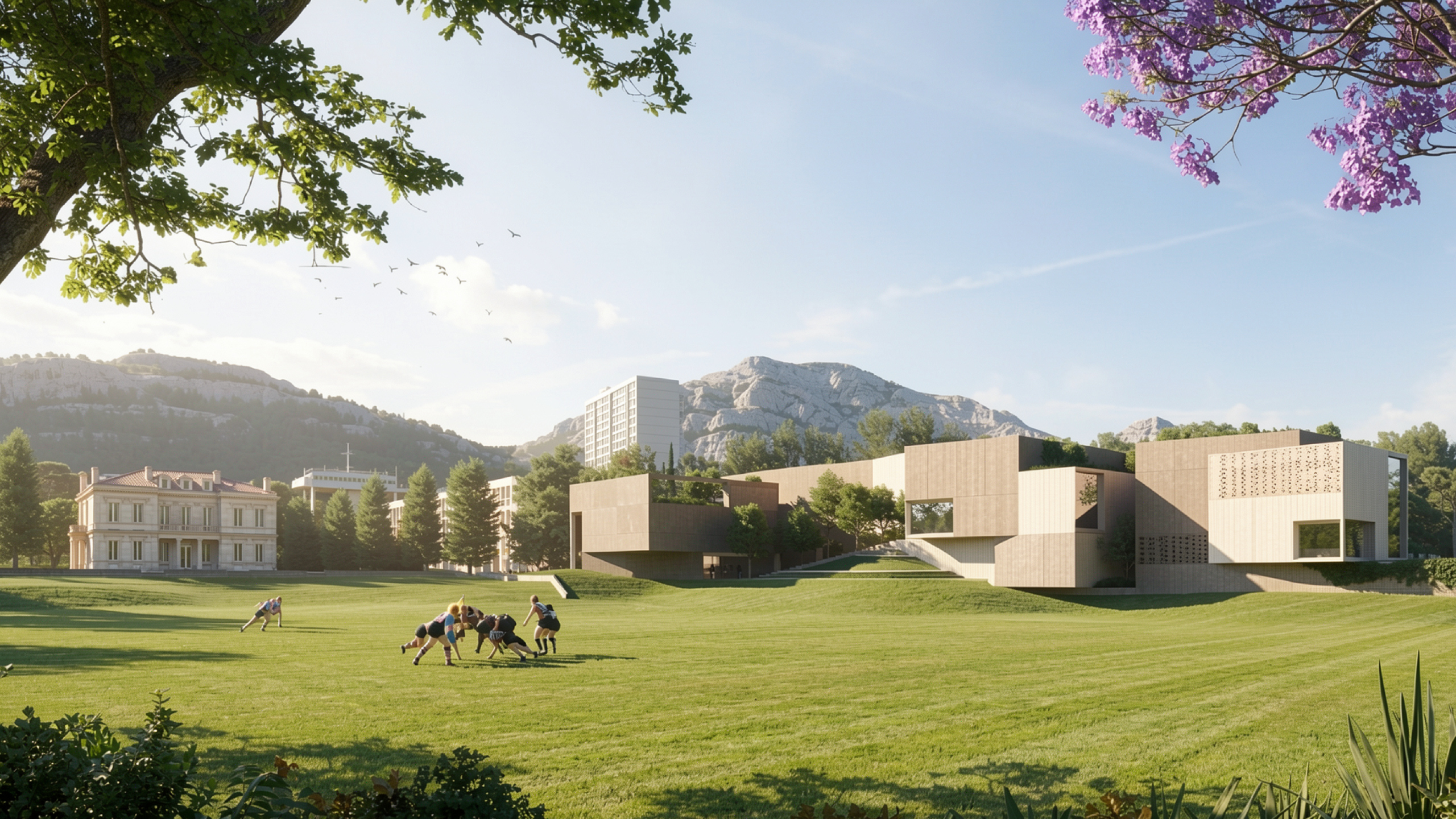 Corporate Academy in Marseille, angular limestone-clad buildings set into a grassy slope, with a historic villa and rugby players on the lawn beyond