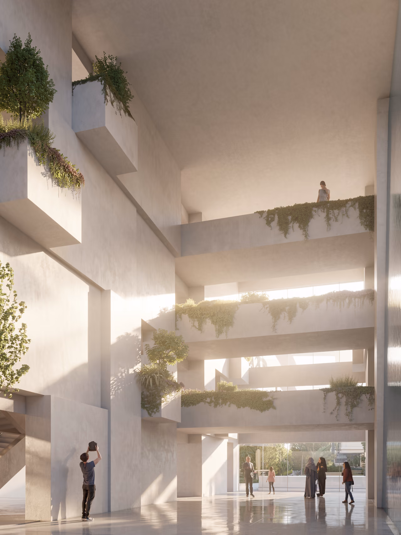 Sunlit interior courtyard of Art Oasis in Riyadh, tiered concrete balconies draped with greenery rising above visitors on the ground floor