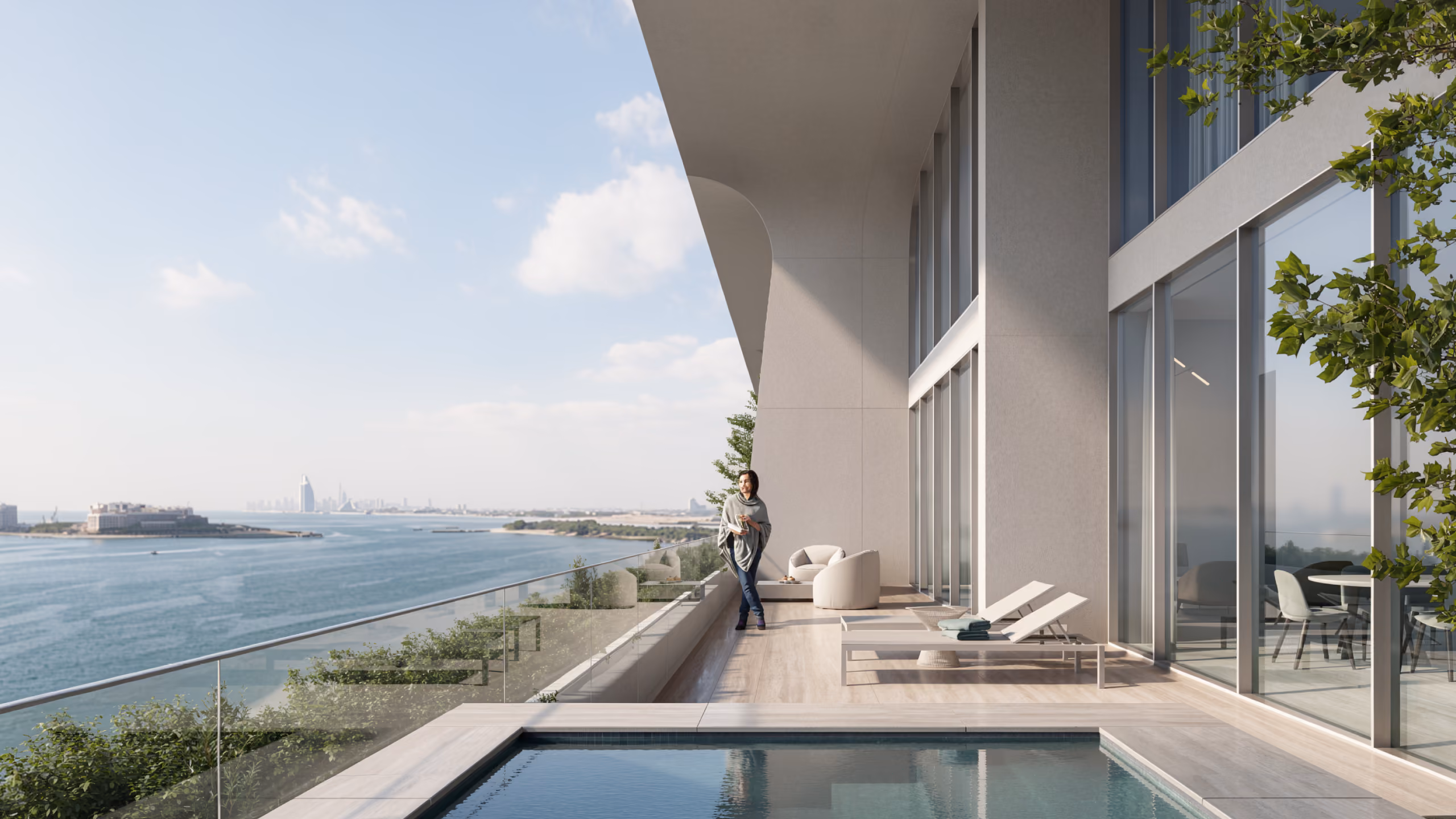 Private terrace and plunge pool at Skylife in Dubai, with loungers, seating and sweeping views over the Arabian Gulf toward the skyline
