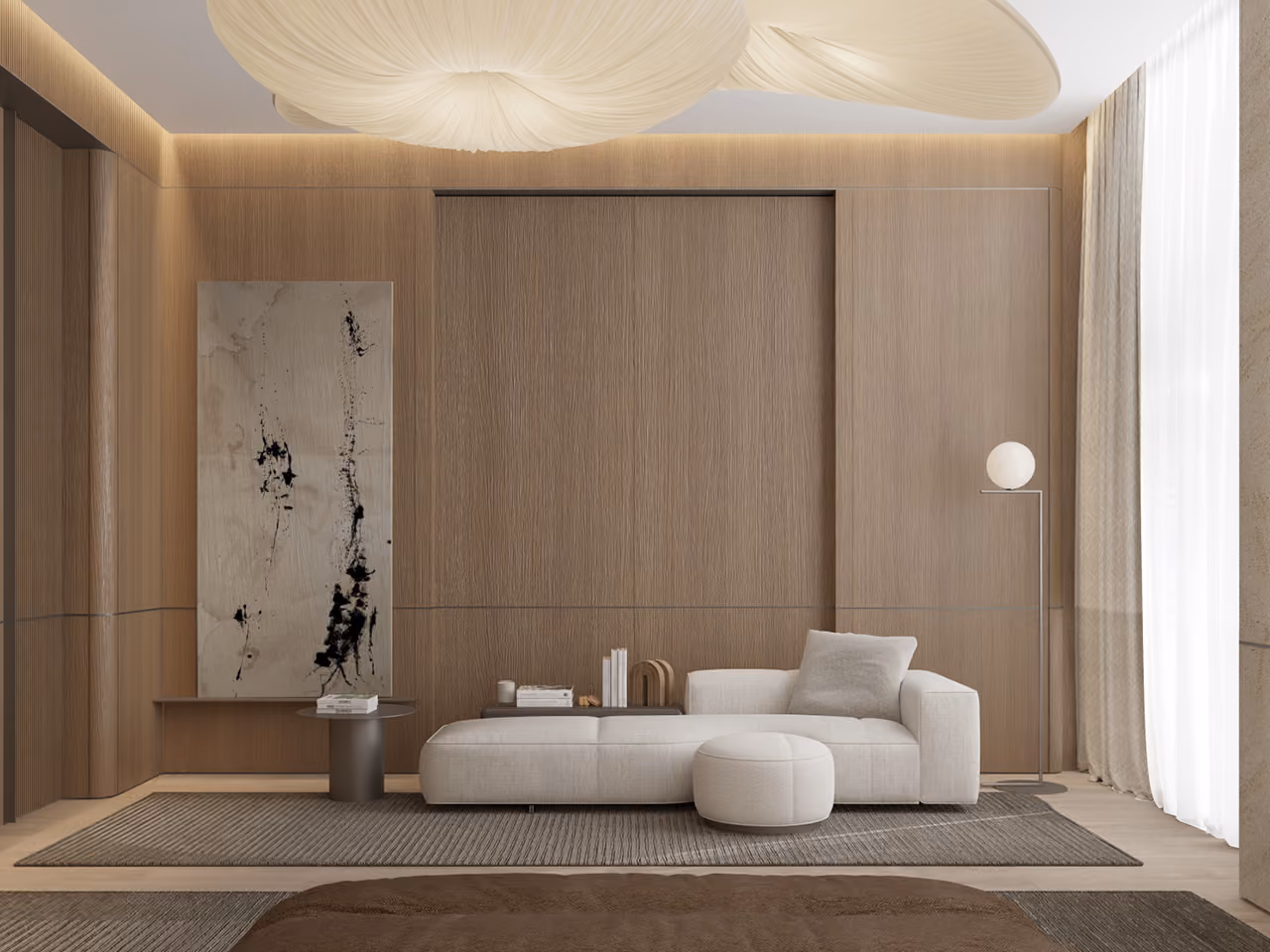 Lounge area in the Nautile villa in Dubai, oak-panelled walls, a cream sectional sofa, sculptural cloud-like pendant light and an abstract framed artwork