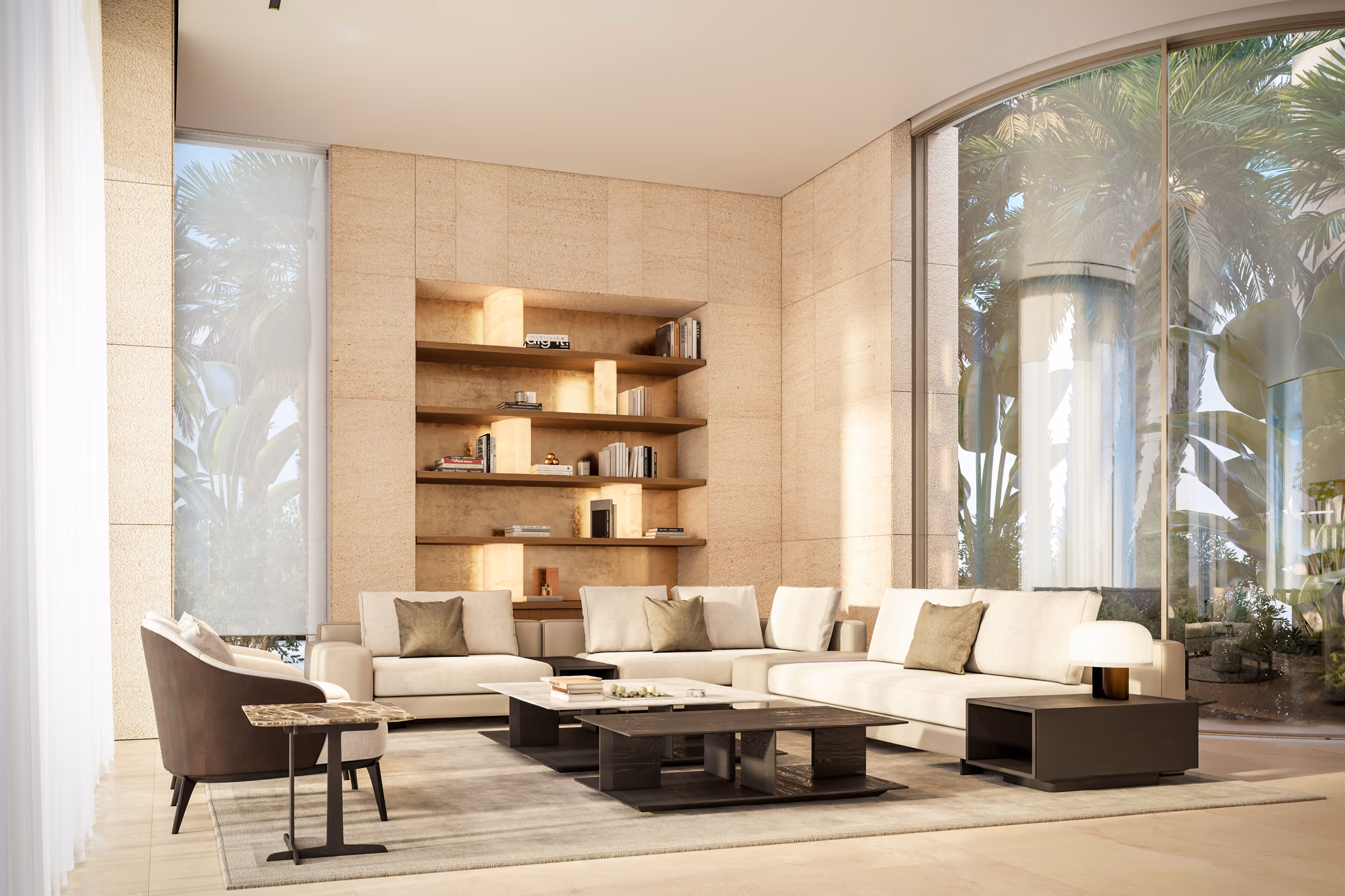 Living room in Nautile villa, Dubai, with curved stone-clad wall and lit built-in shelving, cream sofas around dark stone coffee tables, floor-to-ceiling glazing onto palm greenery
