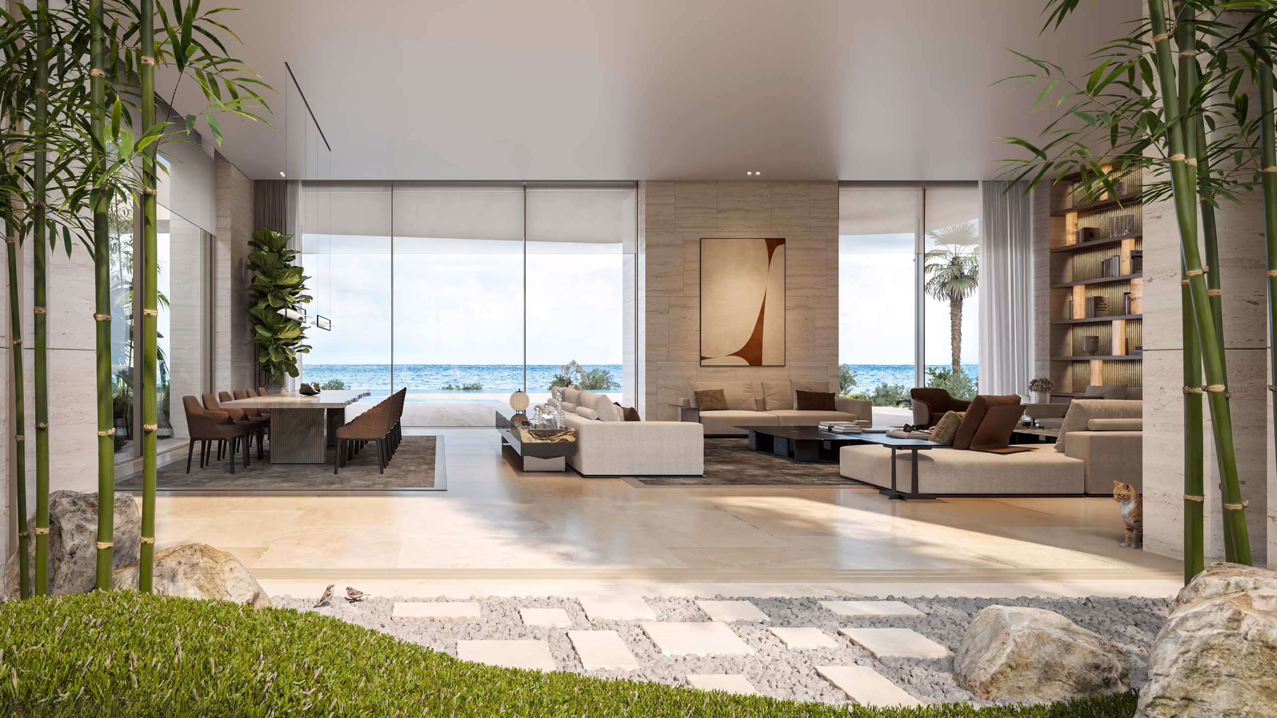 Open-plan living and dining area in Geode villa, Dubai, with stone-clad walls, sea-view glazing, and a landscaped stone garden path in the foreground