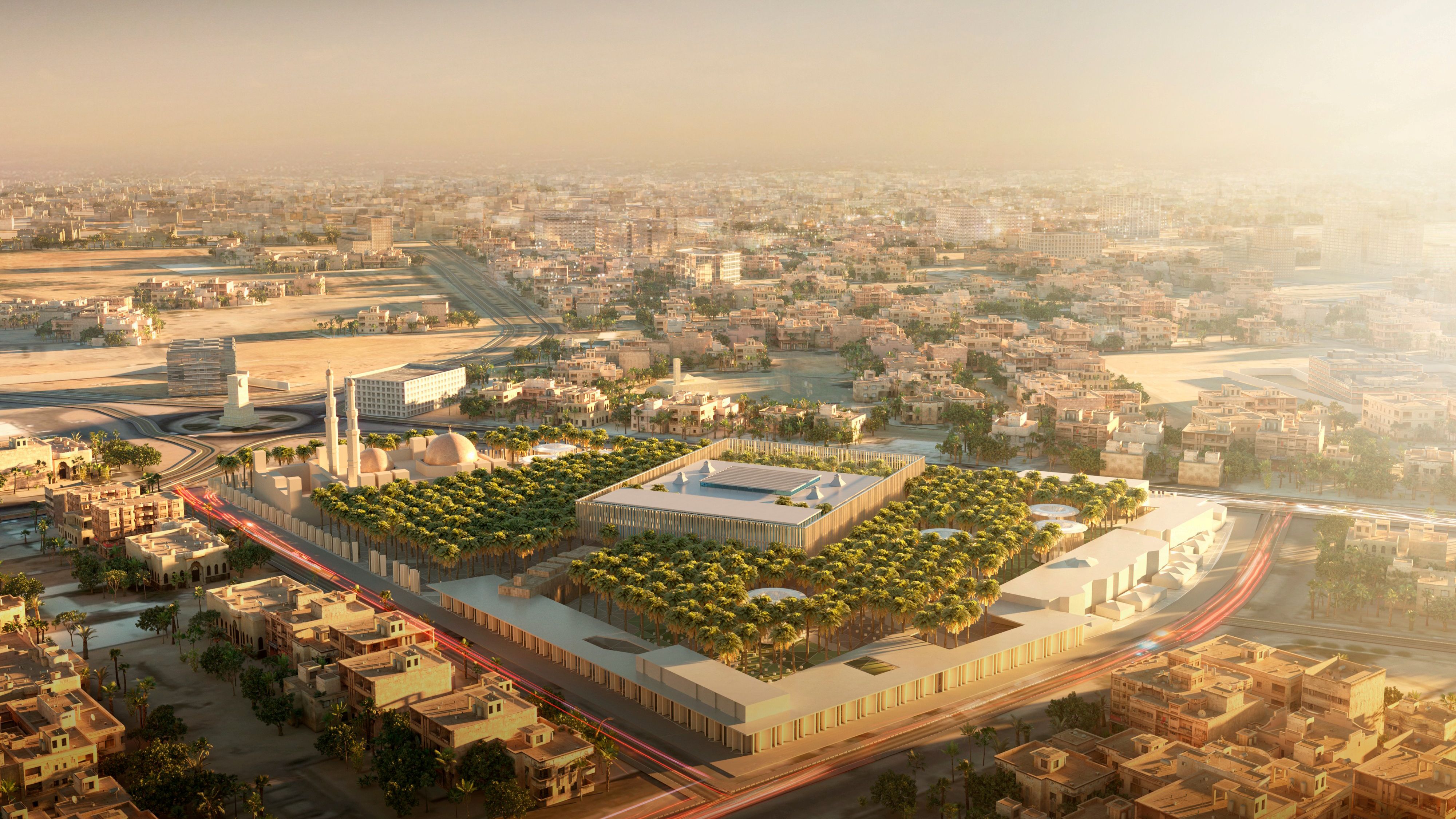 Aerial view of Dar Al Ulum Public Library by Nabil Gholam Architects, a palm-filled courtyard complex set within the dense urban fabric of Al Jouf, Saudi Arabia