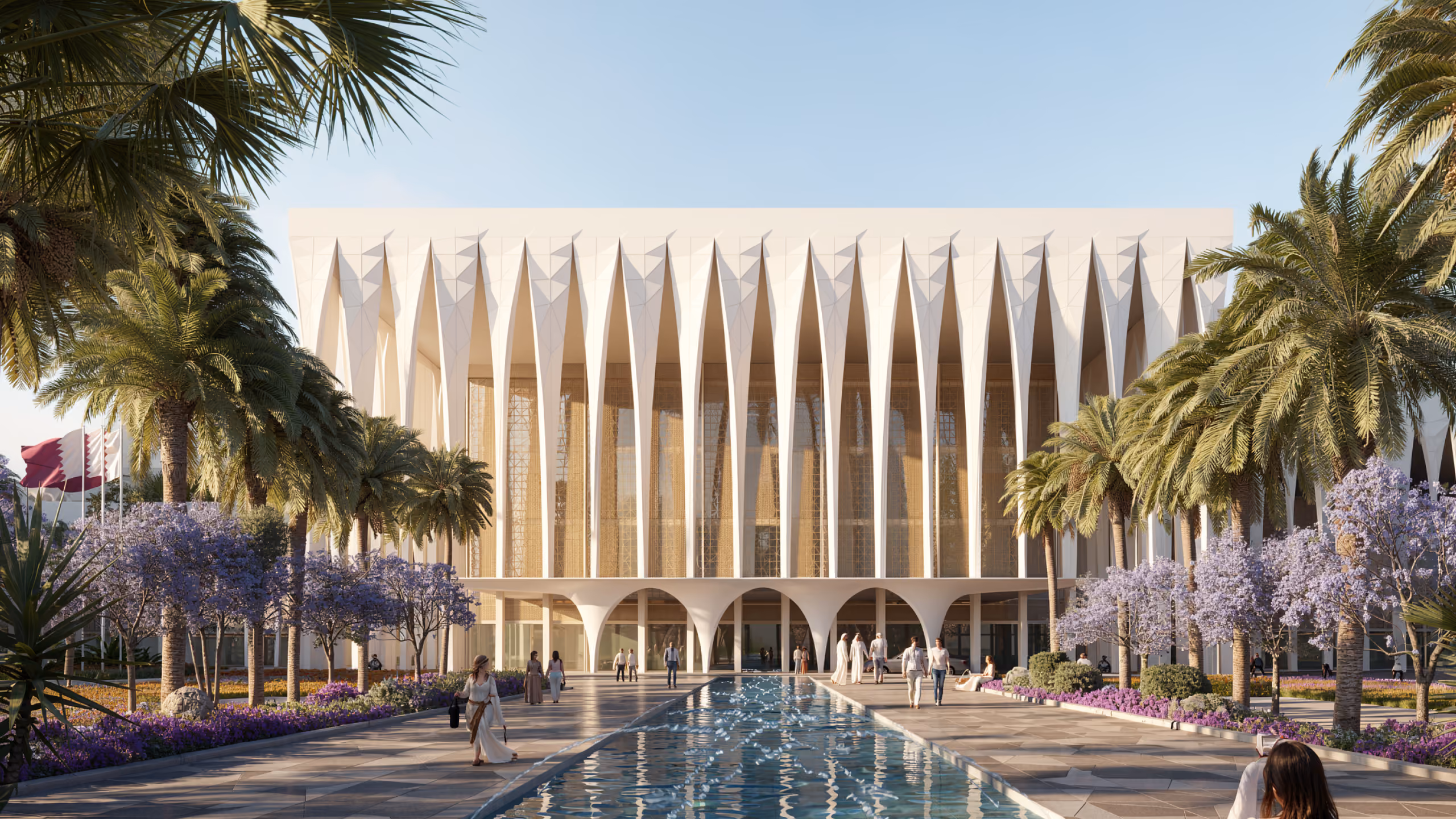 Dar Al Ulum Public Library in Al Jouf, arched colonnade beneath tall pointed white fins along the facade, reflecting pool and palm-lined plaza with visitors