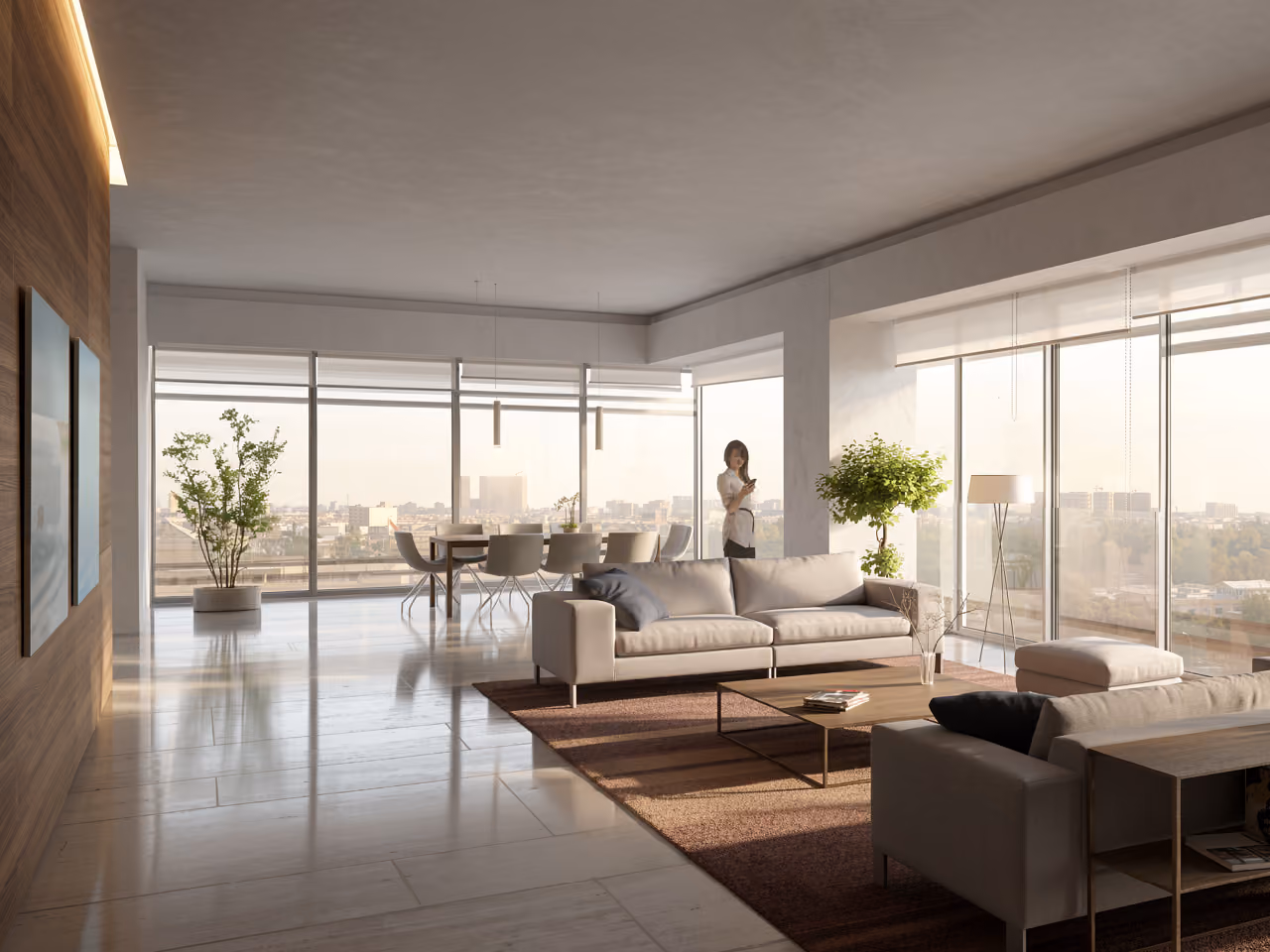 Living room interior of Citadel Tower in Erbil, floor-to-ceiling windows framing panoramic city views, with sofas, dining area and polished stone flooring