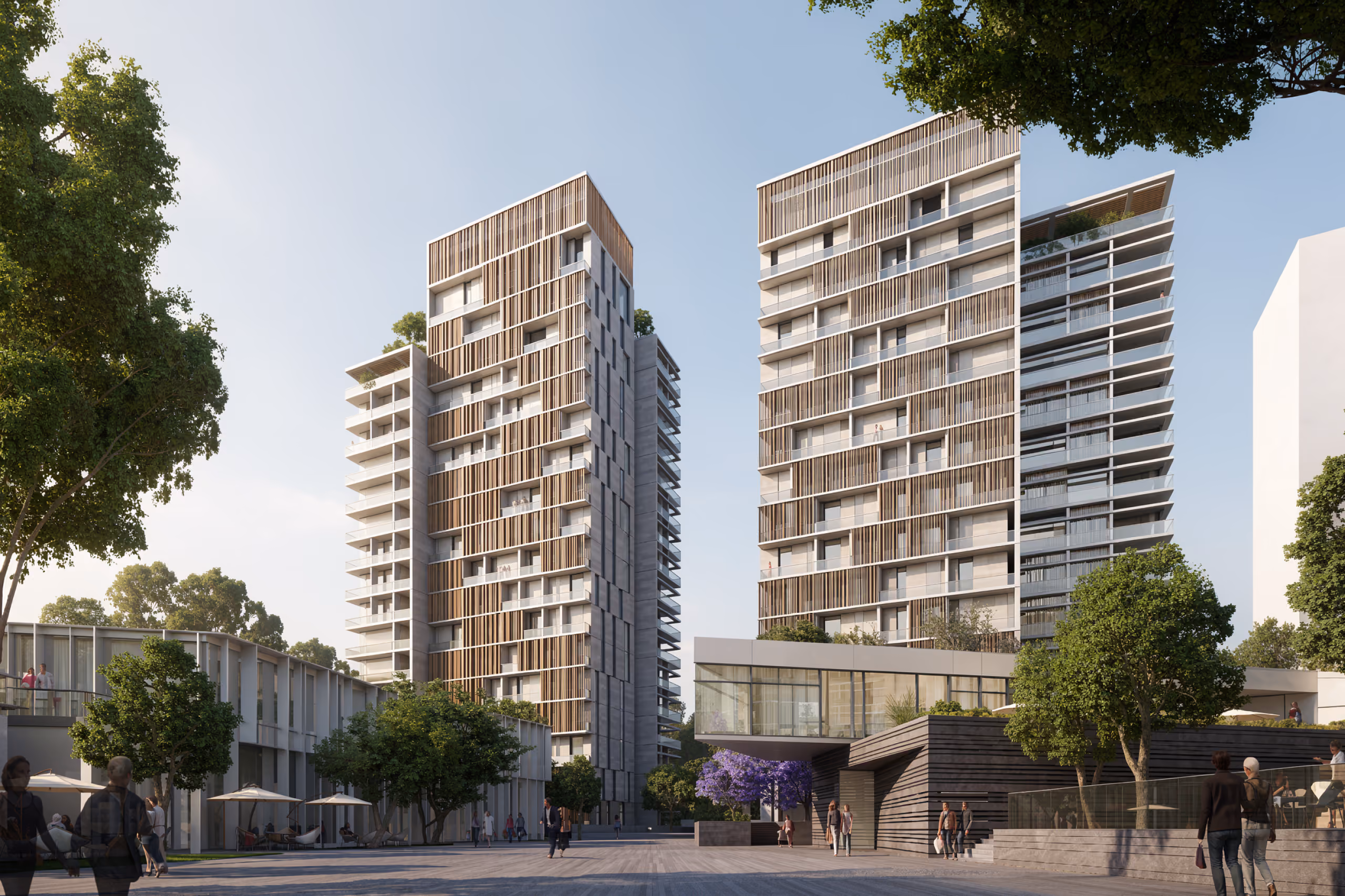 Uptown Park residential towers in Hazmieh, twin high-rises with timber-slat balconies overlooking a landscaped plaza with trees and pedestrians