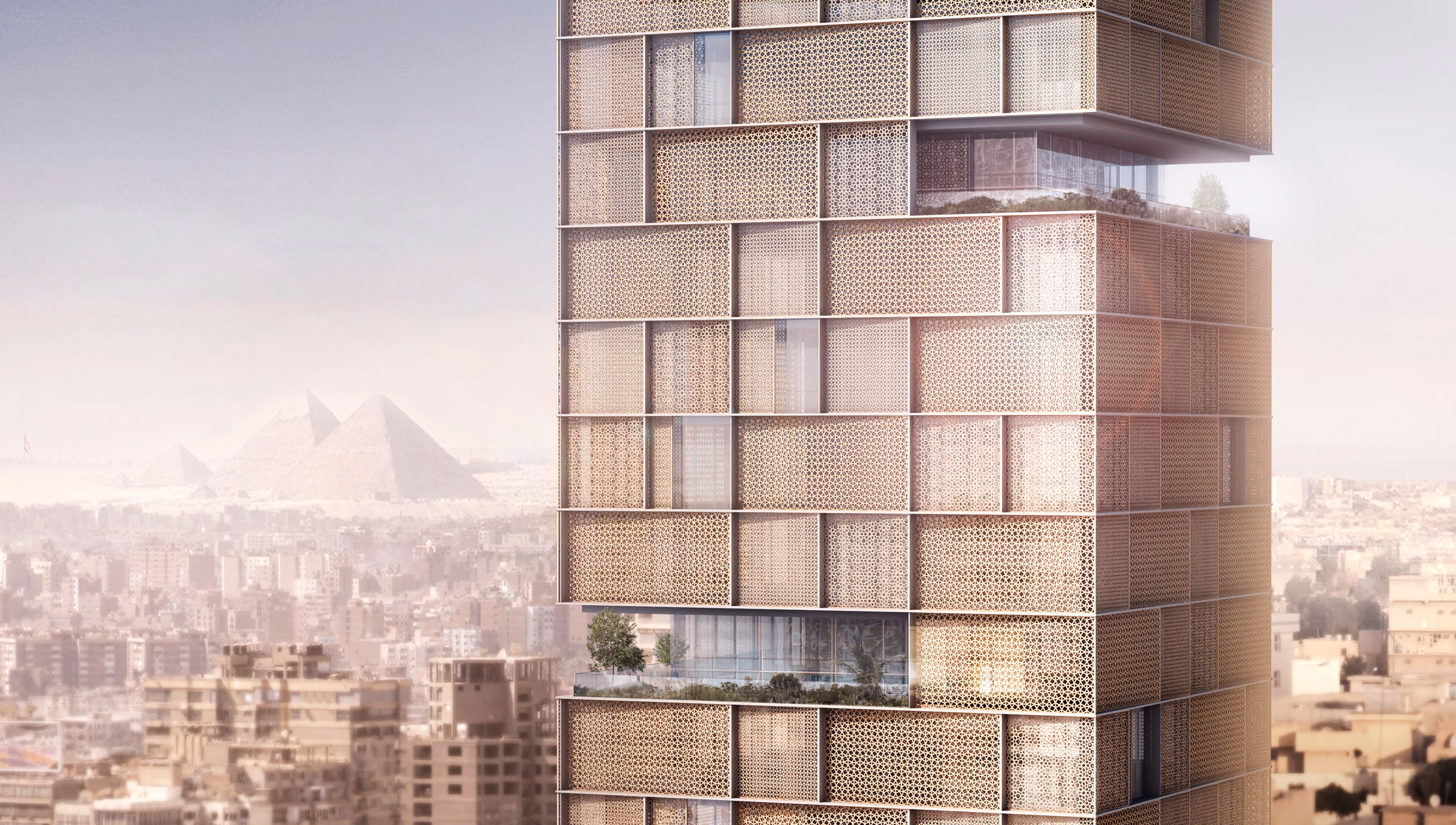 Perforated latticed facade of Nile Tower in Cairo, layered screening panels and terraces with the Giza pyramids visible in the hazy skyline beyond