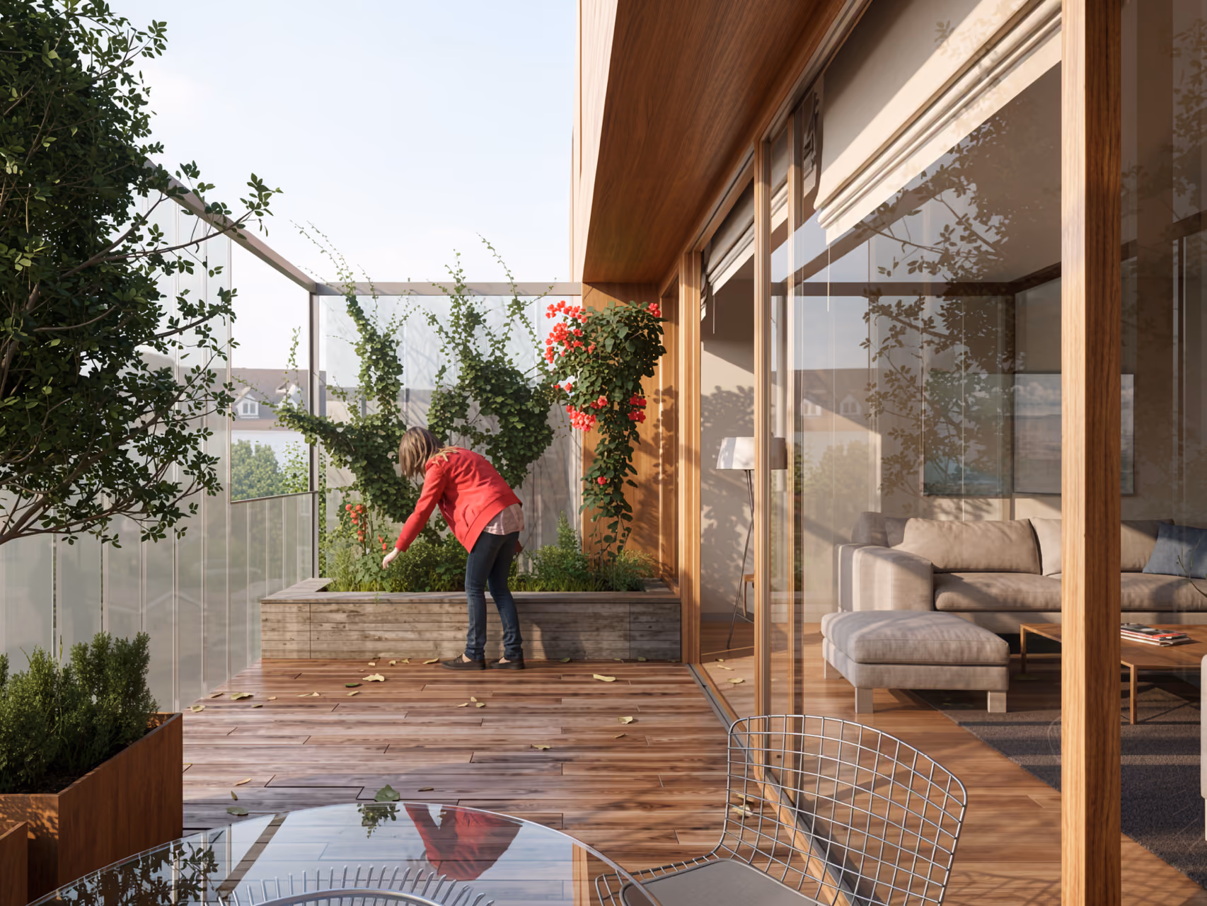 Timber-clad balcony at Wicks Place in Chelmsford, a woman tending planters of climbing roses beside glass sliding doors into a living room