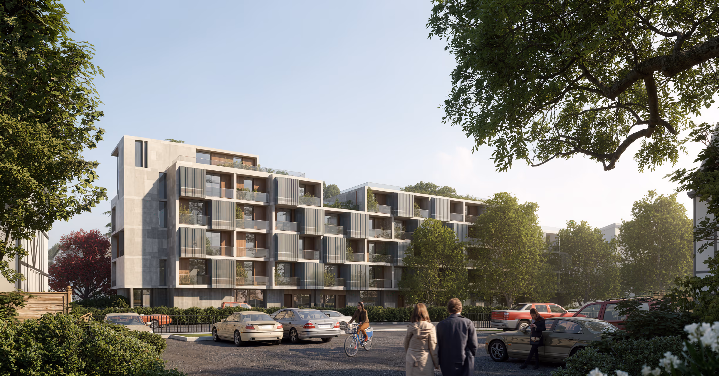 Parkway Road residential building in Chelmsford, tiered stone and timber-slatted facade with planted balconies, pedestrians and parked cars along the street below
