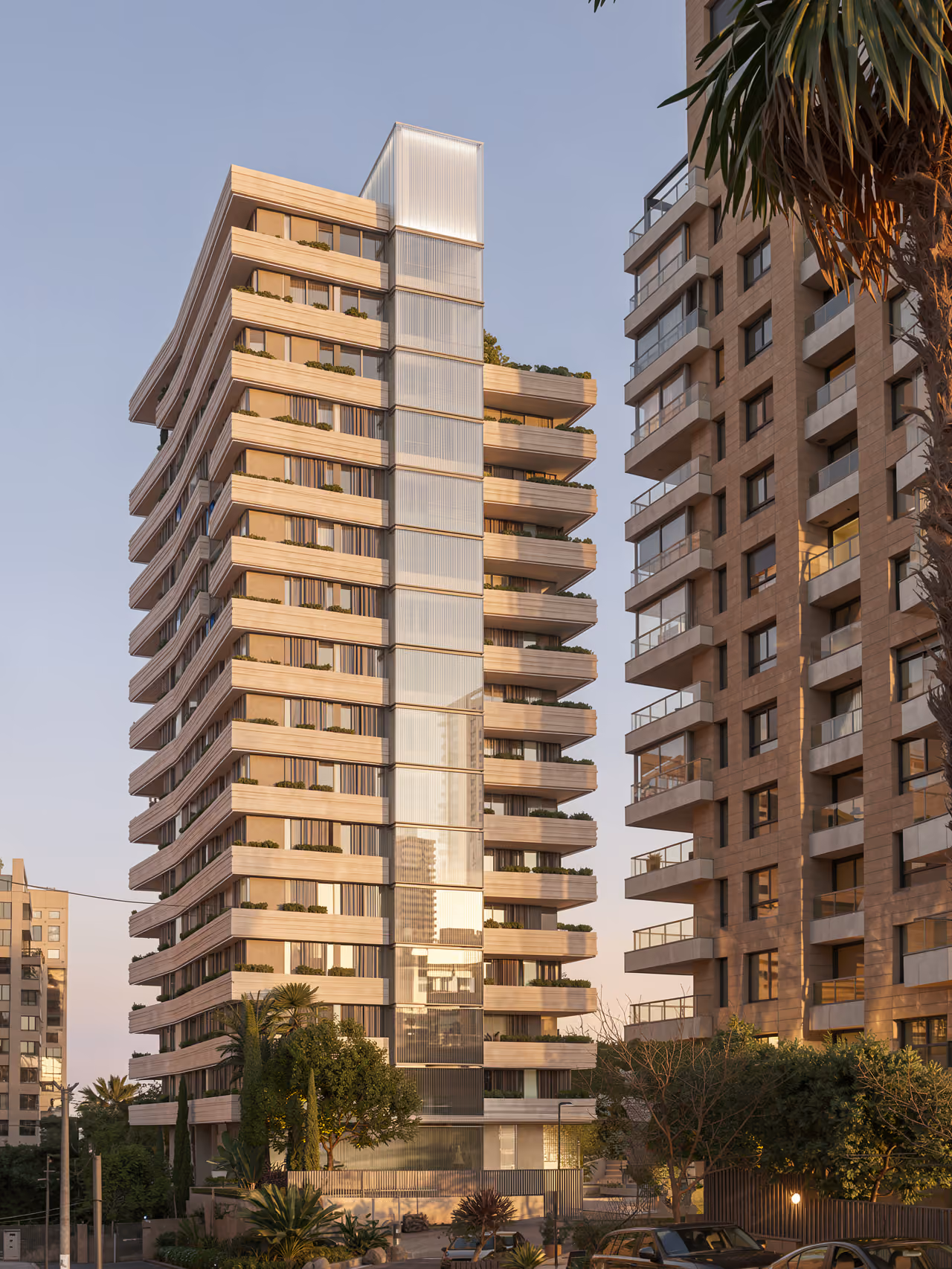 679, residential tower in Raouché, Beirut, with a glazed central core flanked by curving stone-clad balconies and greenery, beside a neighbouring high-rise