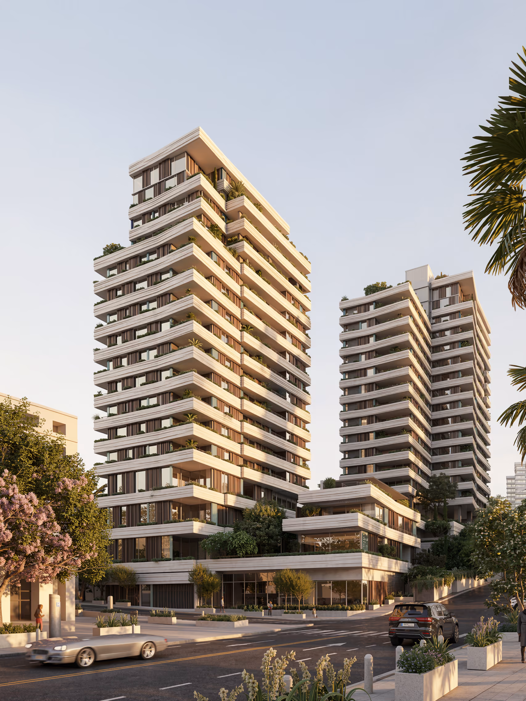 679, twin residential towers of this Raouché complex in Beirut, tiered balconies with greenery, seen from the street with palm trees and passing cars