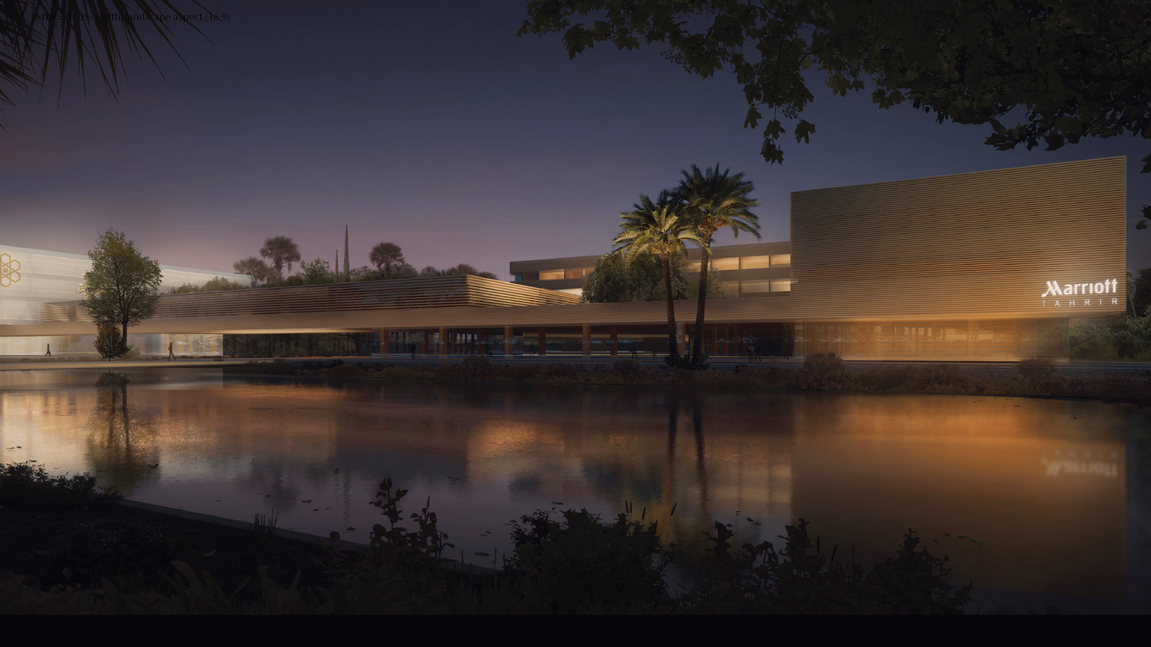 Marriott Tahrir hotel within the Industrial Campus in Ain El Sokhna, illuminated timber-slatted facade and palm trees reflected in a lake at dusk