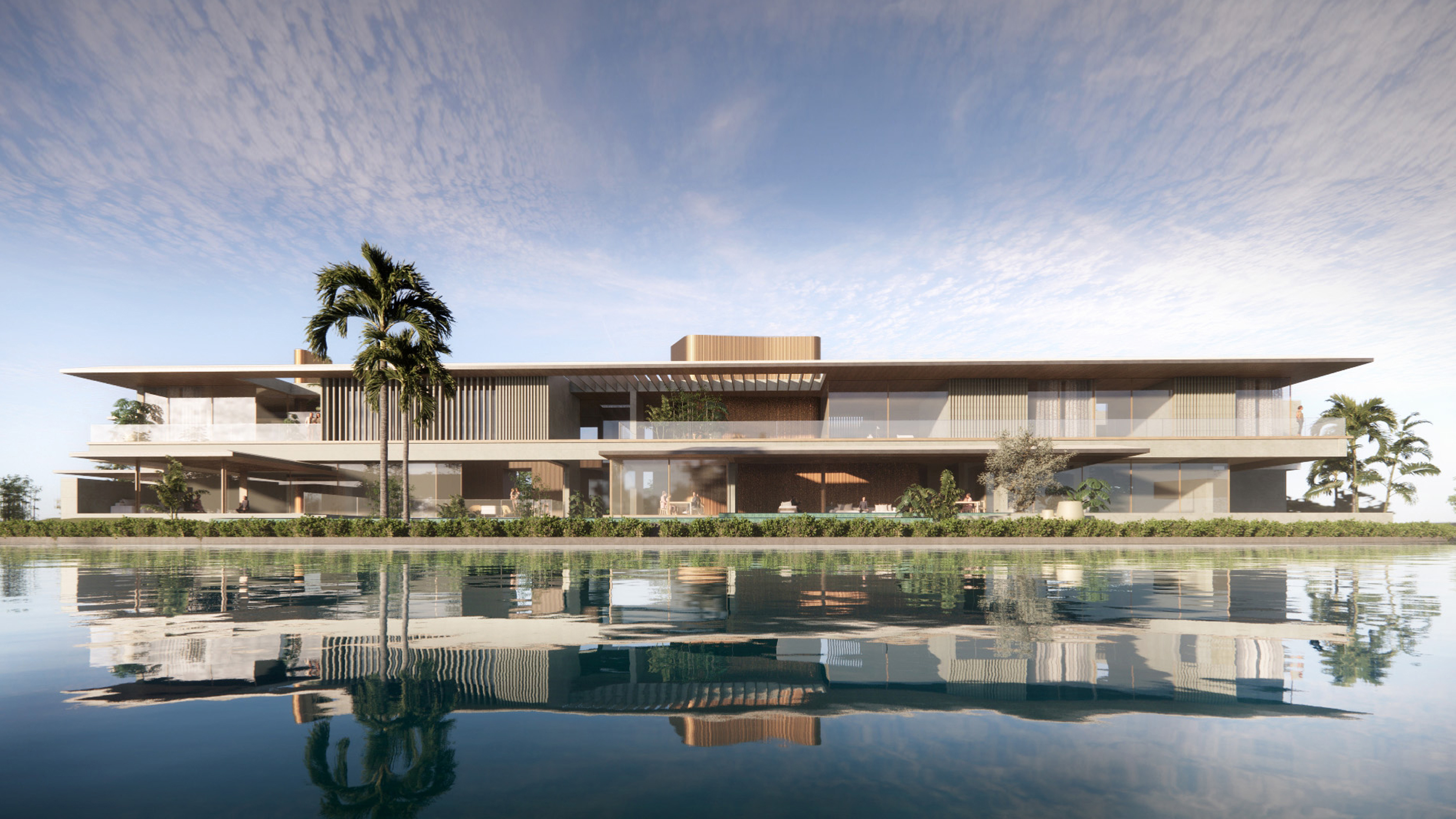 Lagoon Mansion, a low-slung two-storey villa by Nabil Gholam Architects, reflected in a still lagoon amid palm trees in Dubai, United Arab Emirates