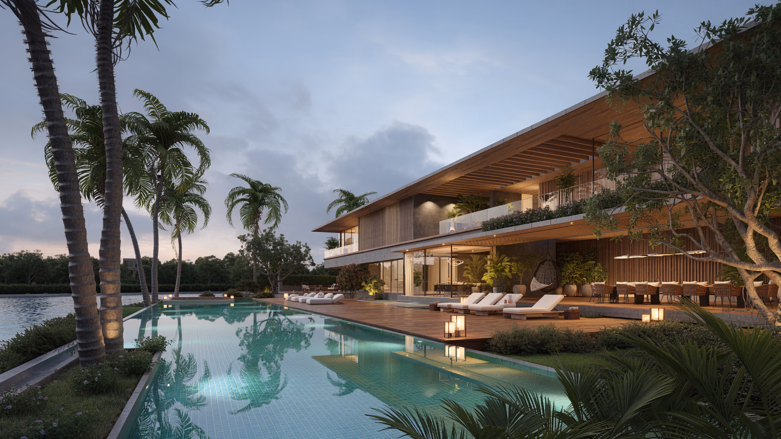 Lagoon Mansion in Dubai, twilight view of the poolside deck with loungers, wooden overhangs and palm trees reflecting in the lagoon-edge pool