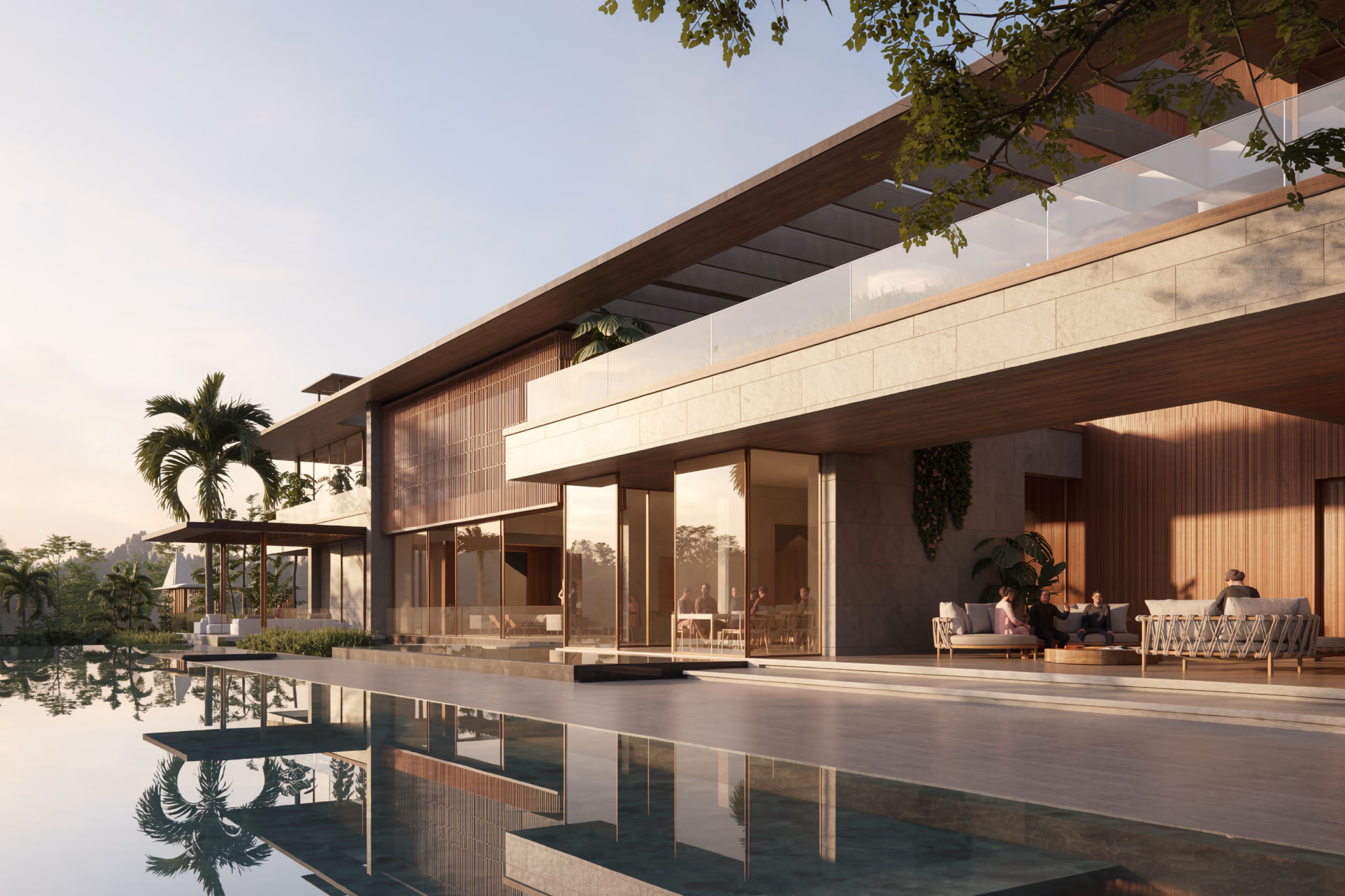 Lounge terrace of Lagoon Mansion in Dubai, timber-clad facade and stone cladding overlooking a reflecting pool with seated guests at dusk