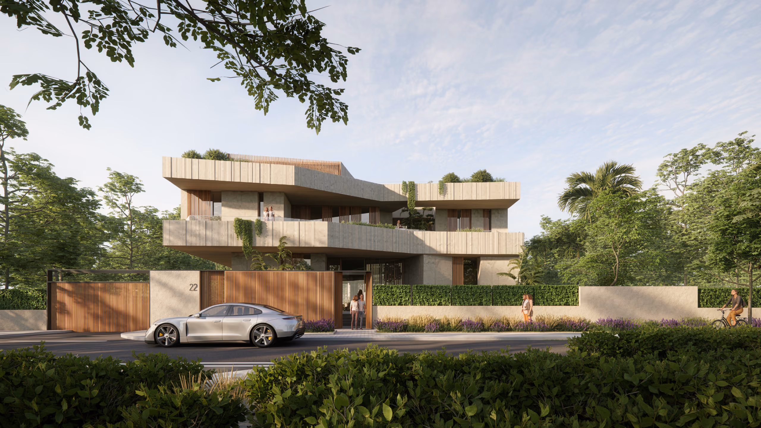 Street view of the Geode villa in Dubai, layered stone-textured volumes with wood-slat gate, greenery and pedestrians along the entrance facade