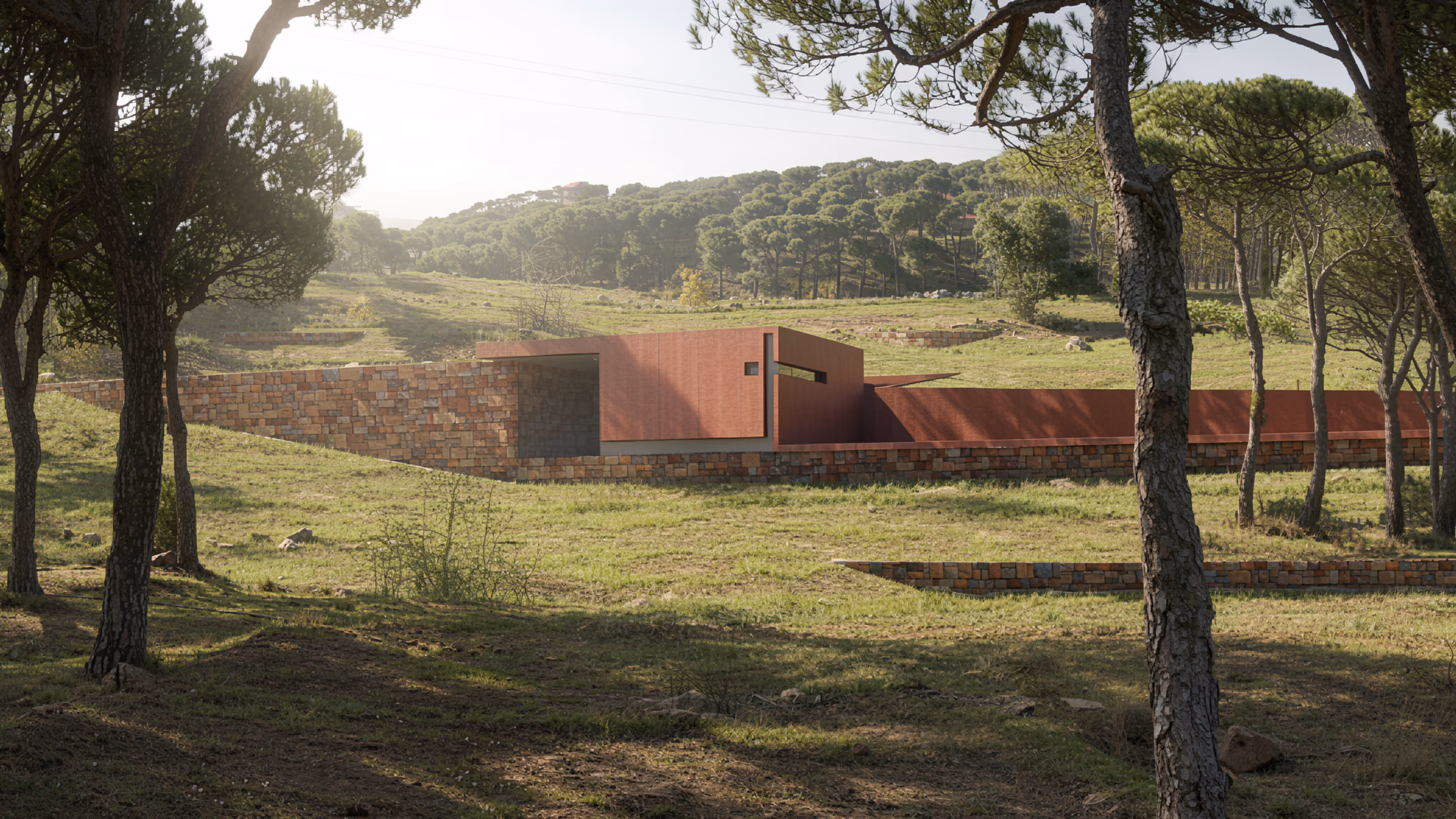 Low-lying stone and Corten steel chapel from The House with Two Lives in Bois de Boulogne, Lebanon, nestled among pine trees on a grassy hillside