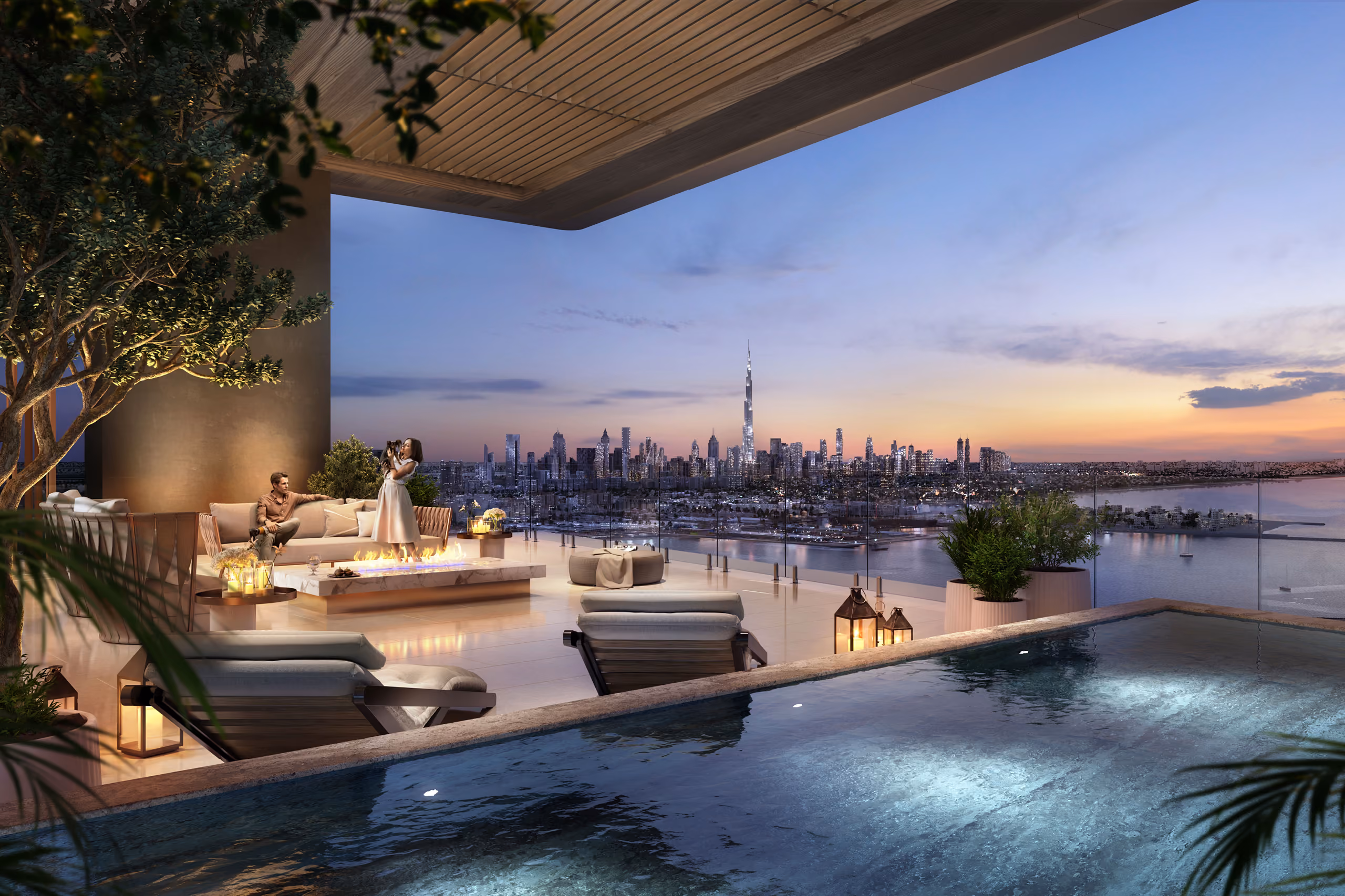 Rooftop terrace of Orise in Dubai at dusk, with infinity pool, lounge seating and firepit overlooking the illuminated skyline including the Burj Khalifa