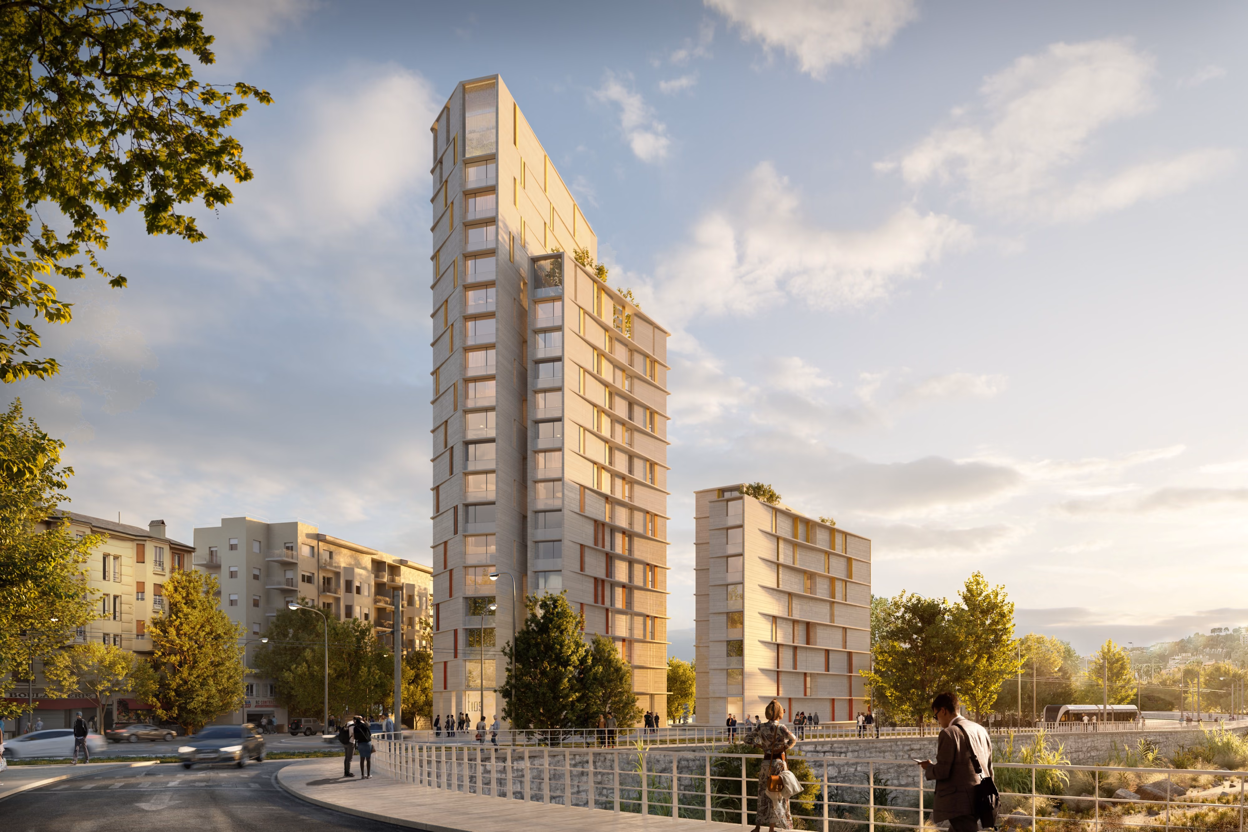 Tour de Nice, twin residential towers with perforated stone-toned facades by Nabil Gholam Architects, overlooking a riverside walkway in Nice, France
