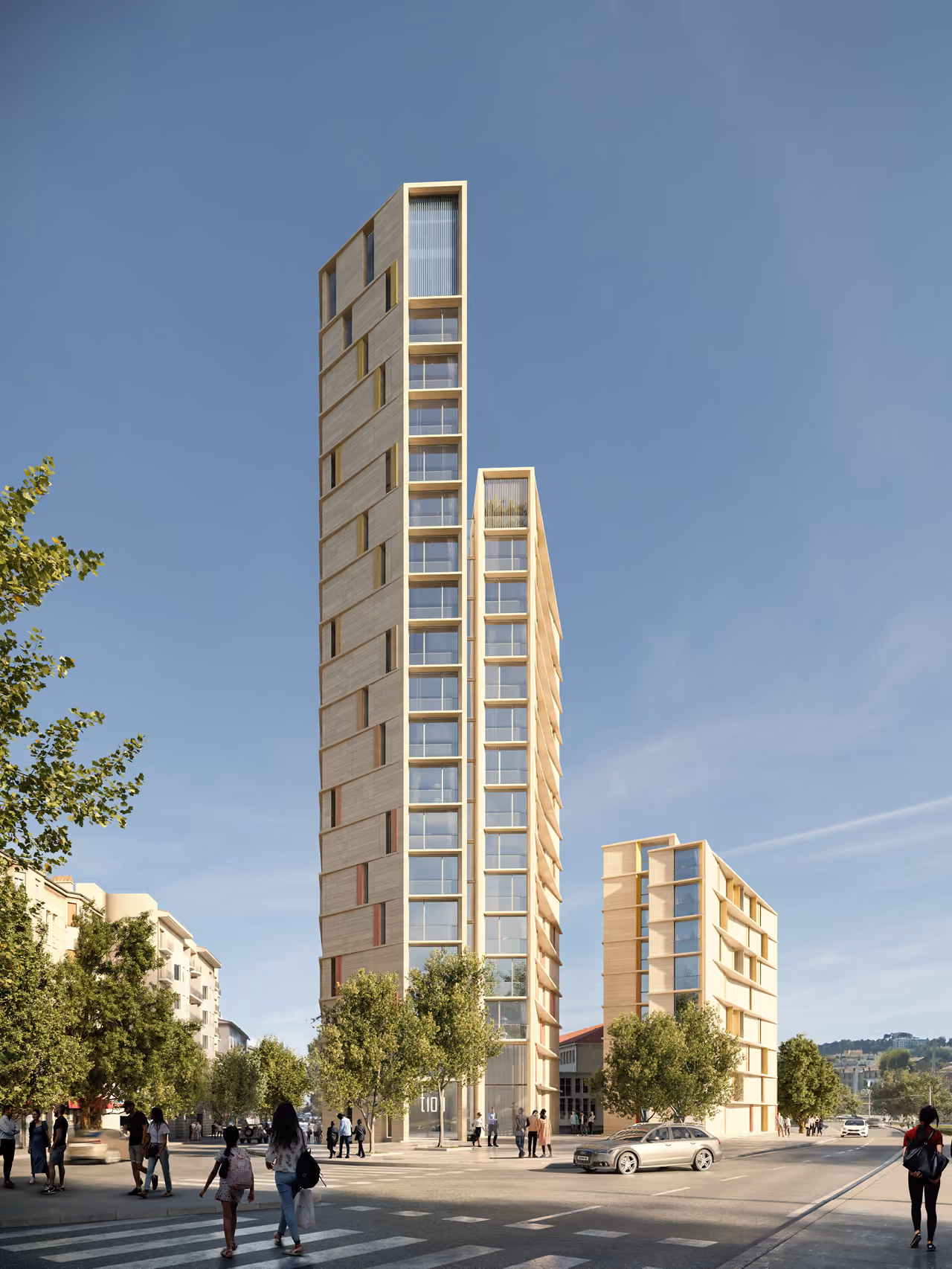 Tour de Nice, twin timber-clad residential towers with staggered balconies, seen from a tree-lined street with pedestrians and passing cars
