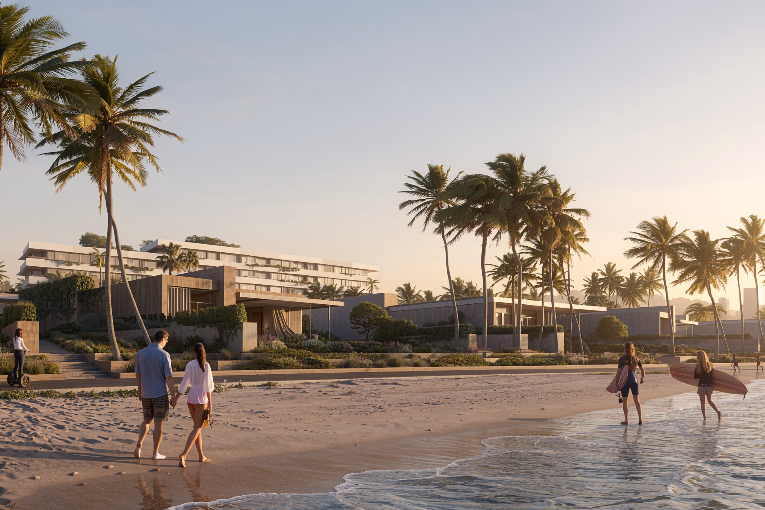 Beachfront view of Al Zorah Shores in Ajman, low-rise stone and white buildings amid palm trees, with people walking and surfers along the shore at sunset