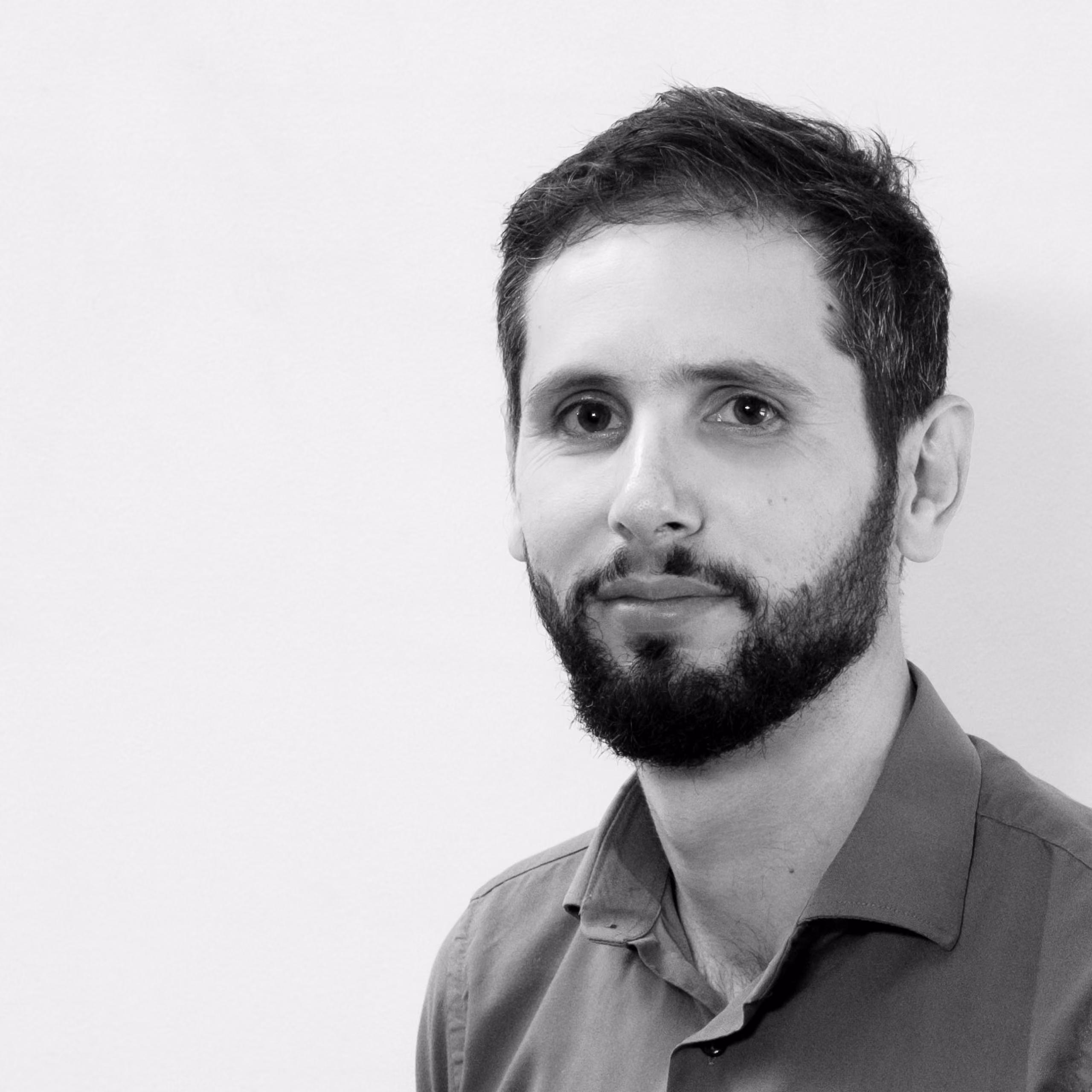 Mohamad El Zein, Computer Generated Imagery at Nabil Gholam Architects, black and white portrait with a beard and collared shirt