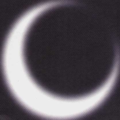 Eid al-Fitr 2007 greeting card by Nabil Gholam Architects, a glowing crescent moon shape set against a dark textured background